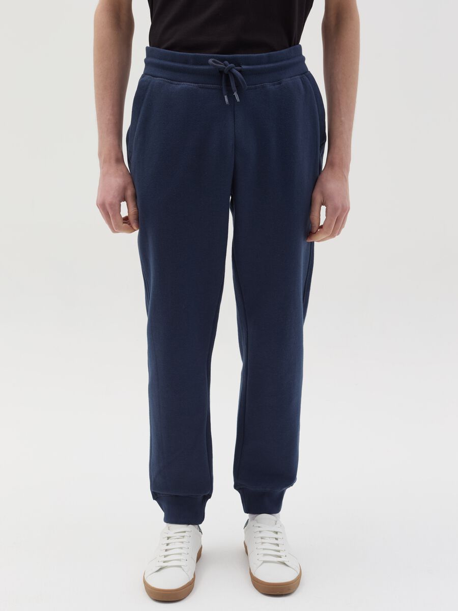 Fleece joggers with pockets and drawstring_1