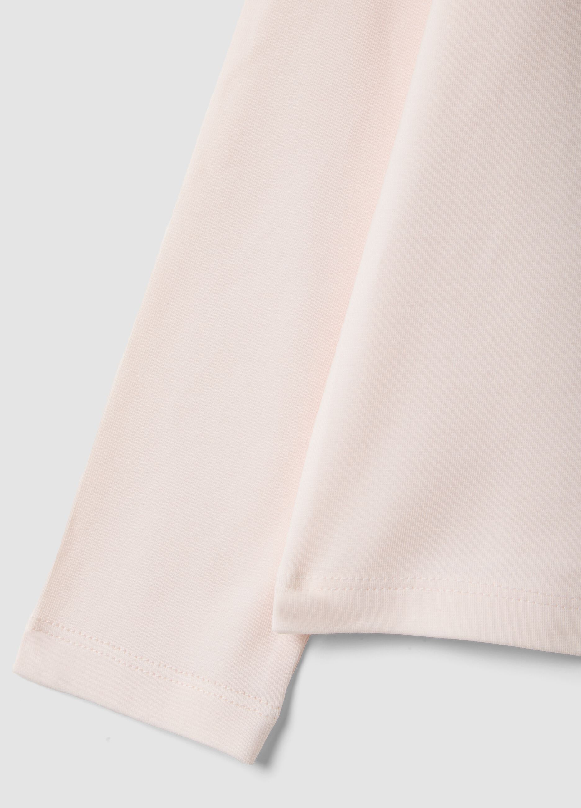 T-shirt rosa in cotone elasticizzato con stampa arcobaleno
