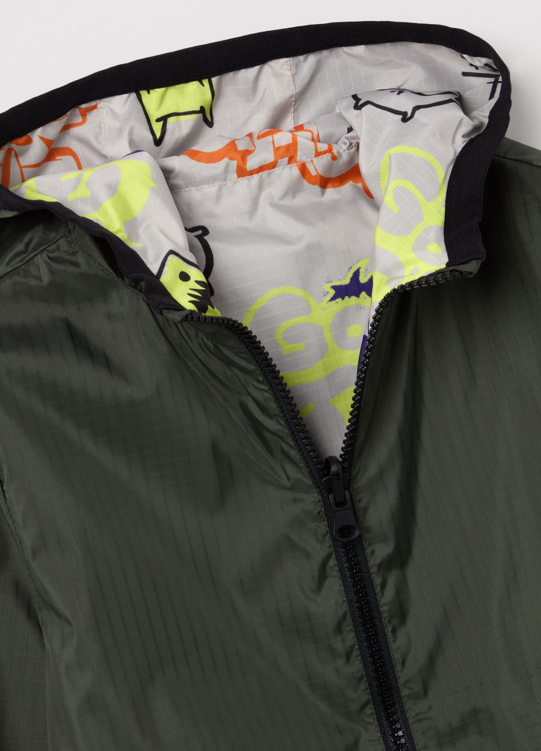 Full-zip reversible jacket with hood
