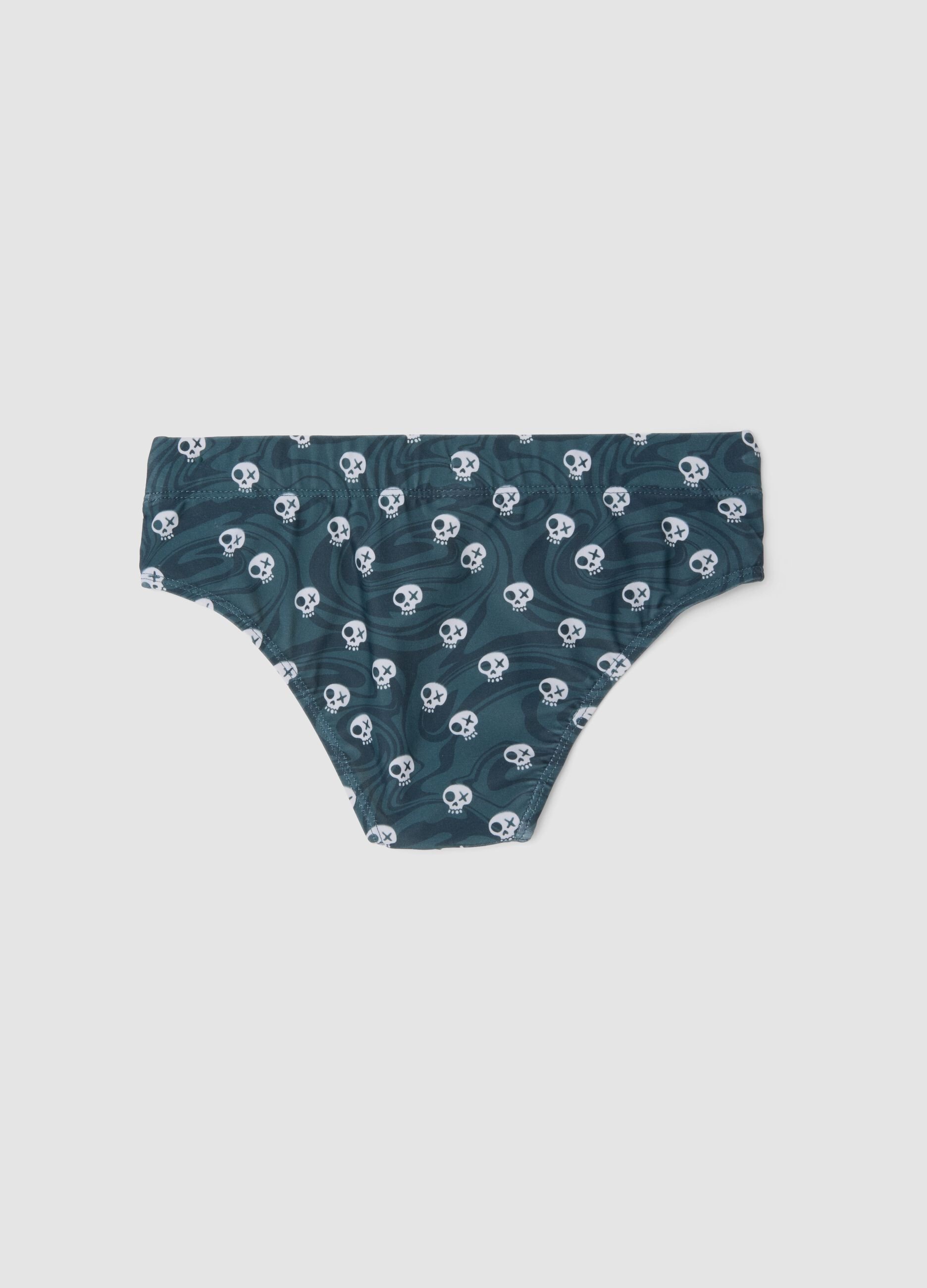 Blue stretch swim briefs with skull print