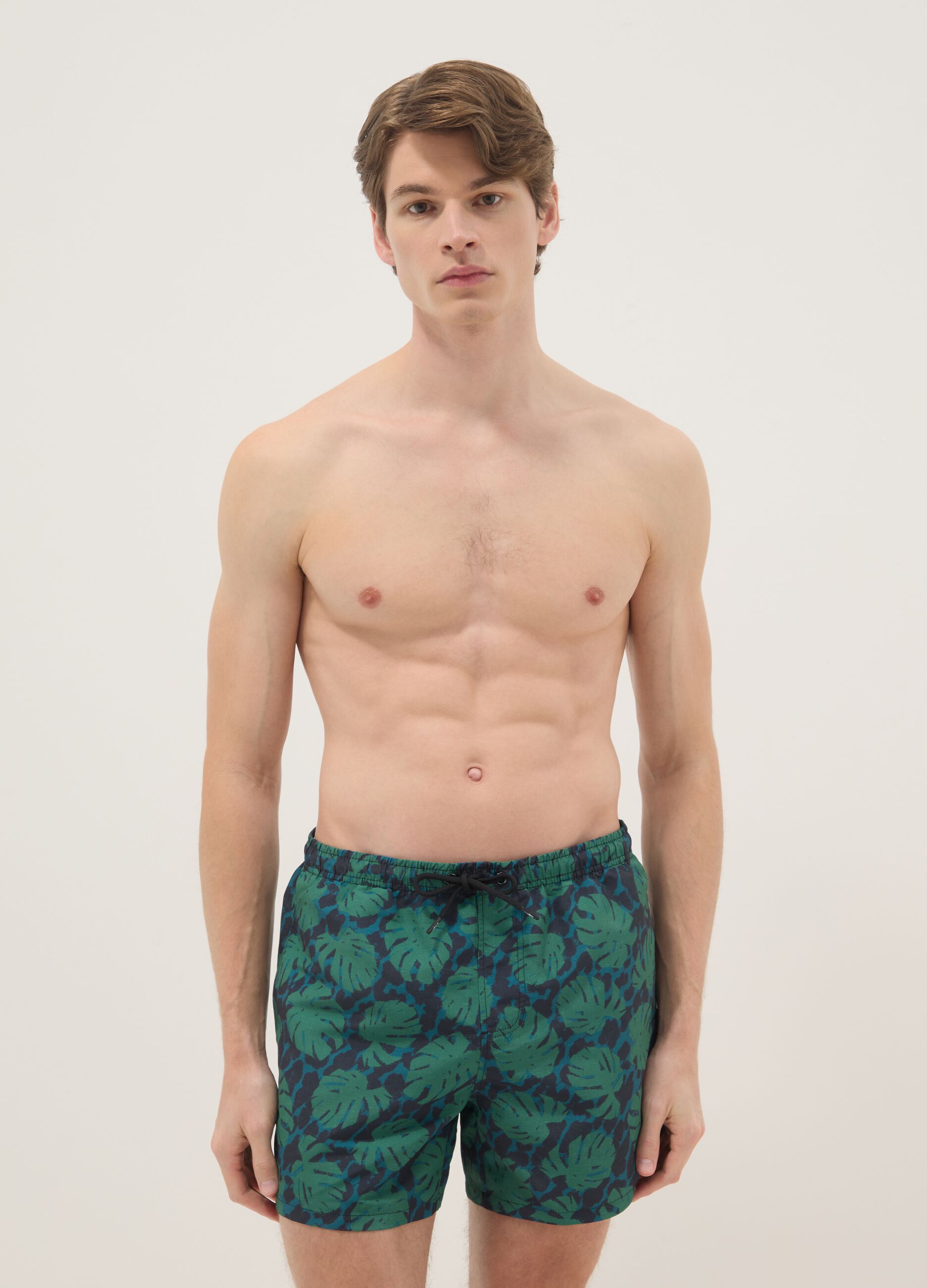 Multicolour tropical print swim shorts