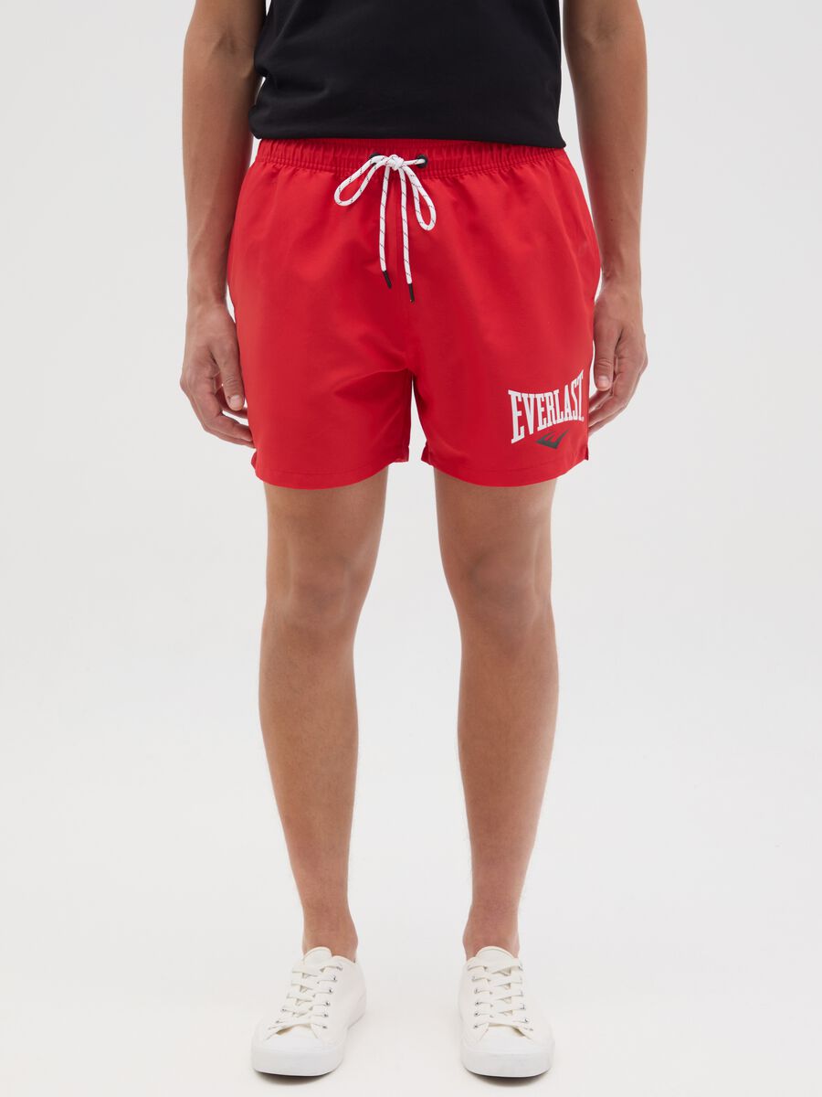 Red swimming trunks with logo print_1