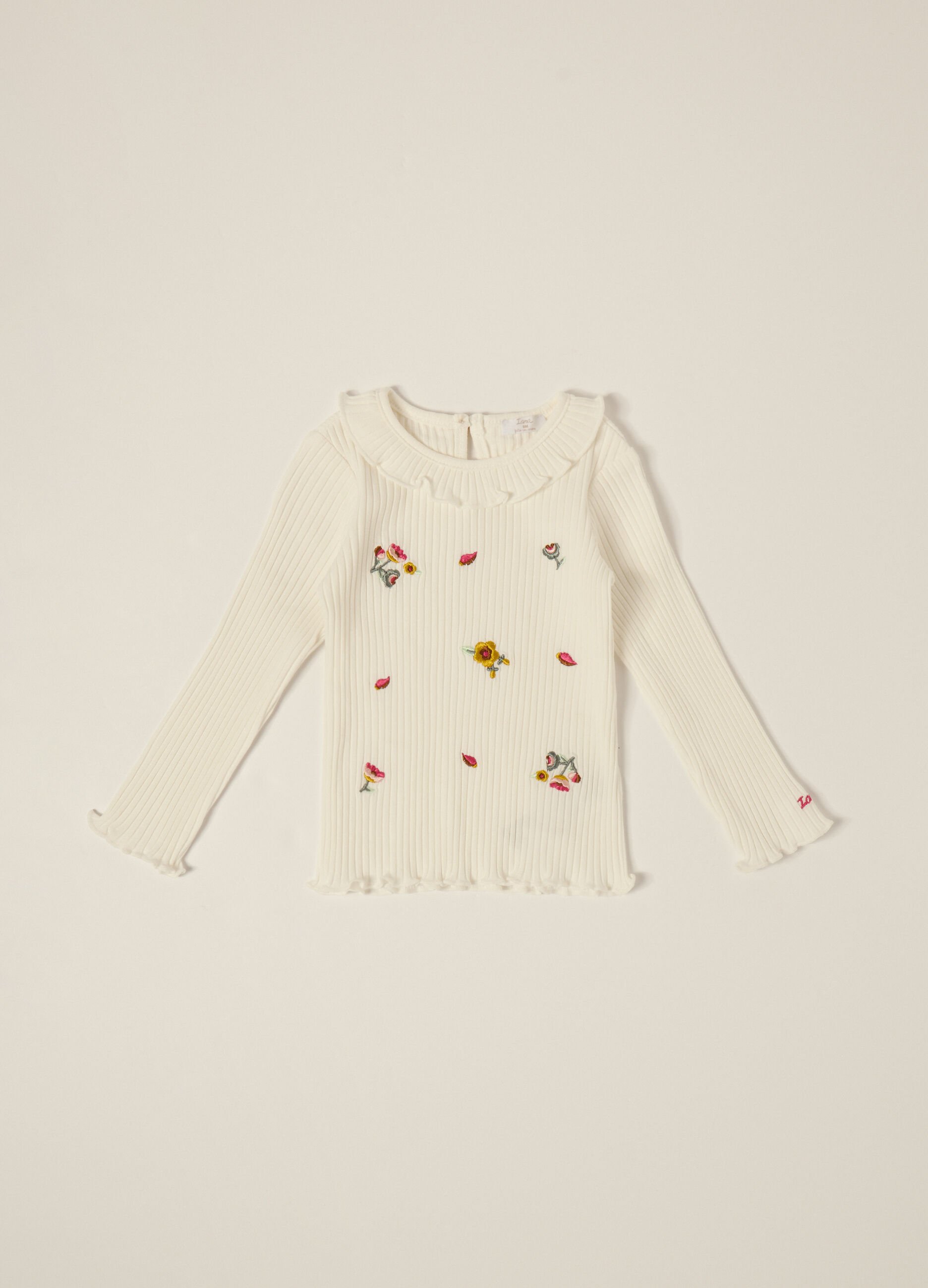 White long sleeve top with embroidery