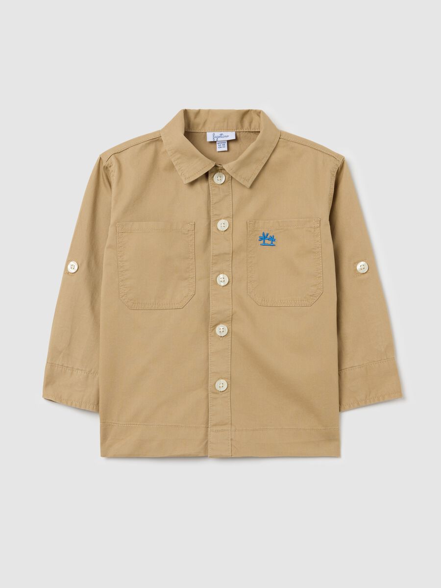 Beige shirt in cotton with pockets and palms embroidery_0