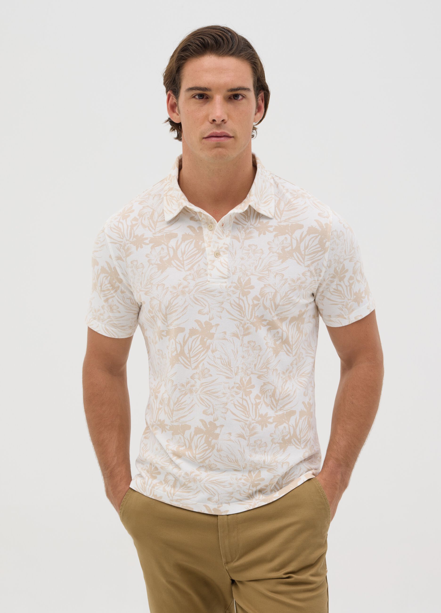 Polo a maniche corte beige con stampa floreale BST