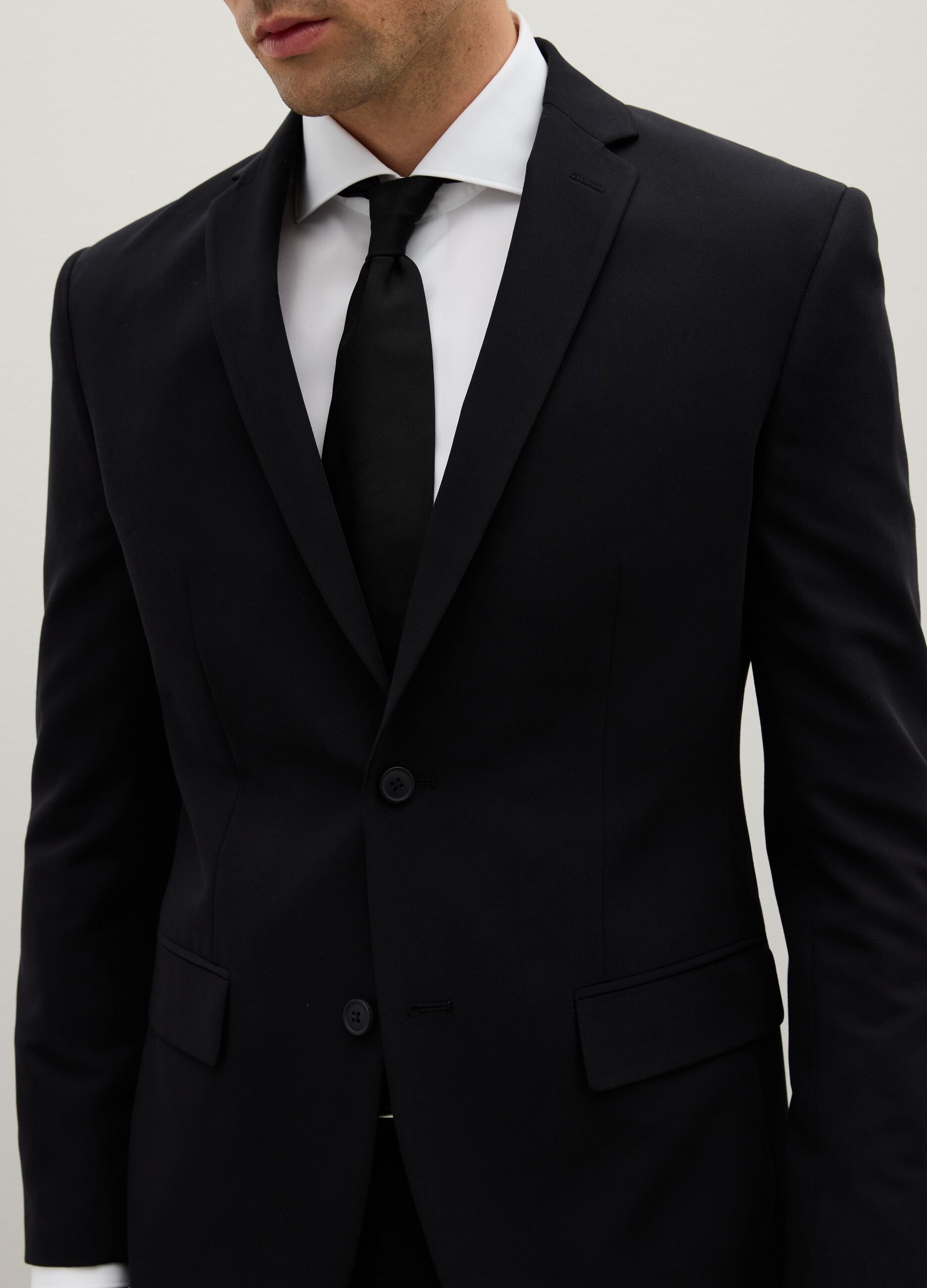 Black slim fit blazer with button closure