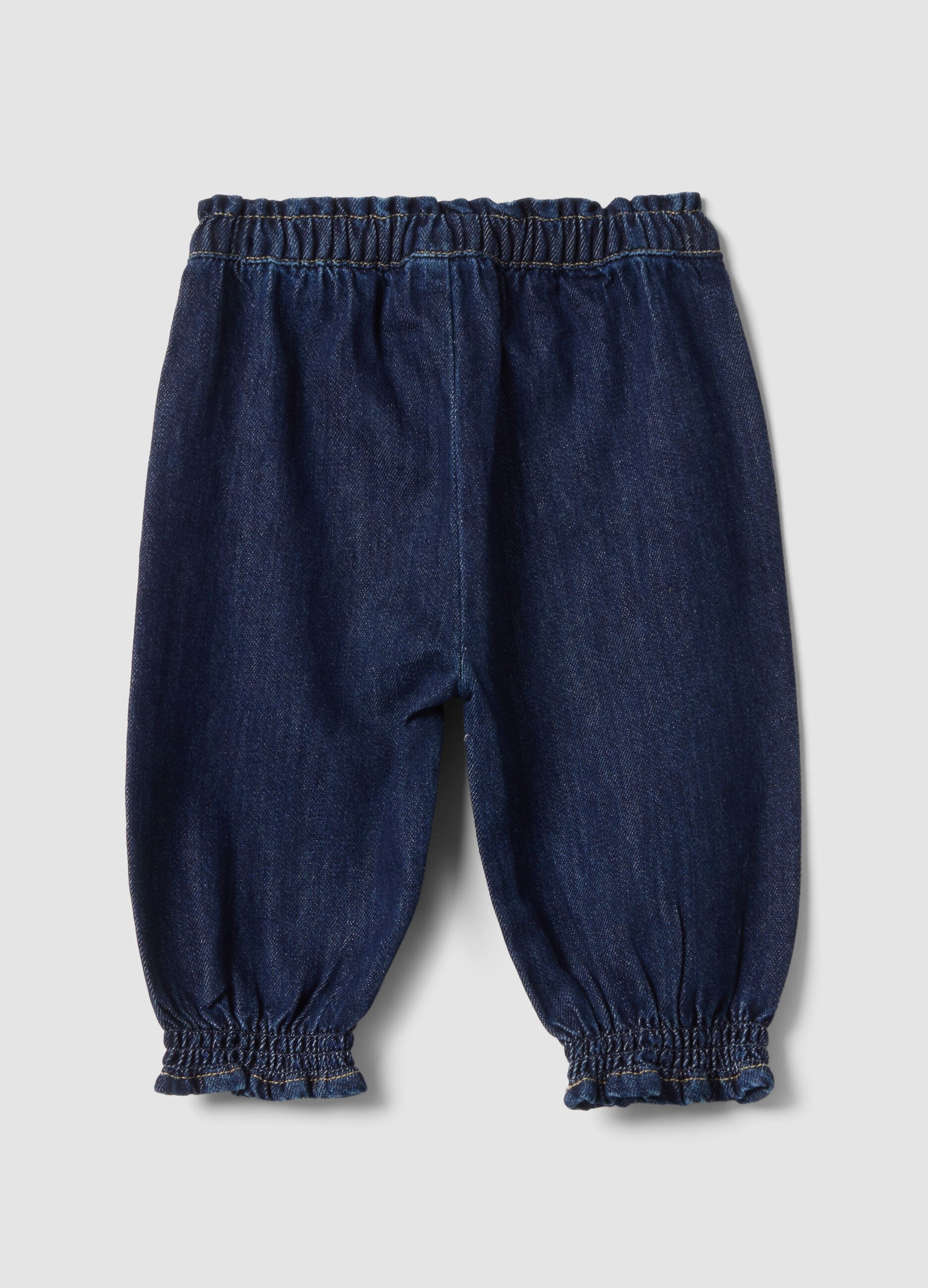 Jogger denim blu in misto cotone e viscosa con ricami floreali comfort fit