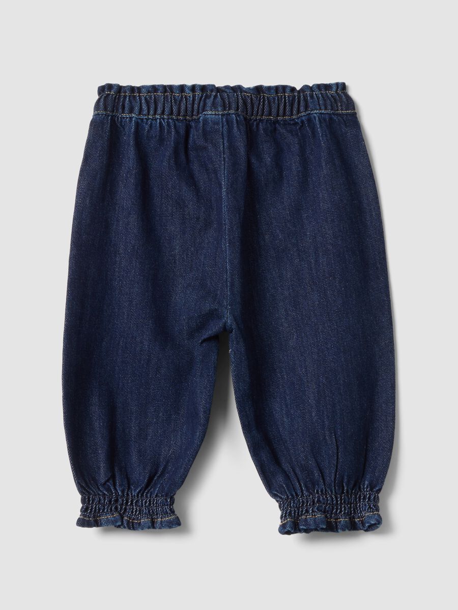 Blue denim joggers in cotton-viscose blend with floral embroidery, comfort fit_1