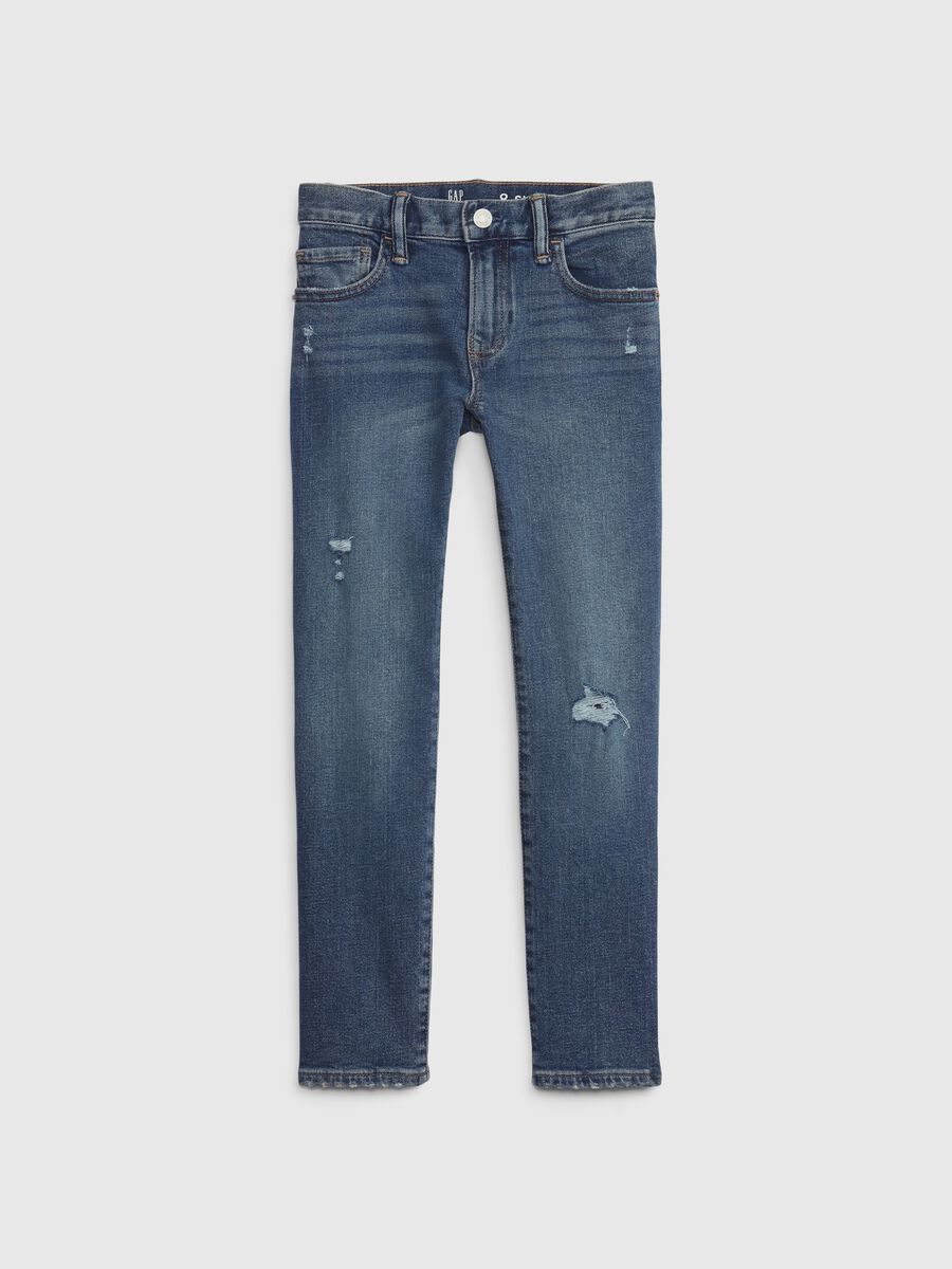 Jeans slim fit con scoloriture e abrasioni_0