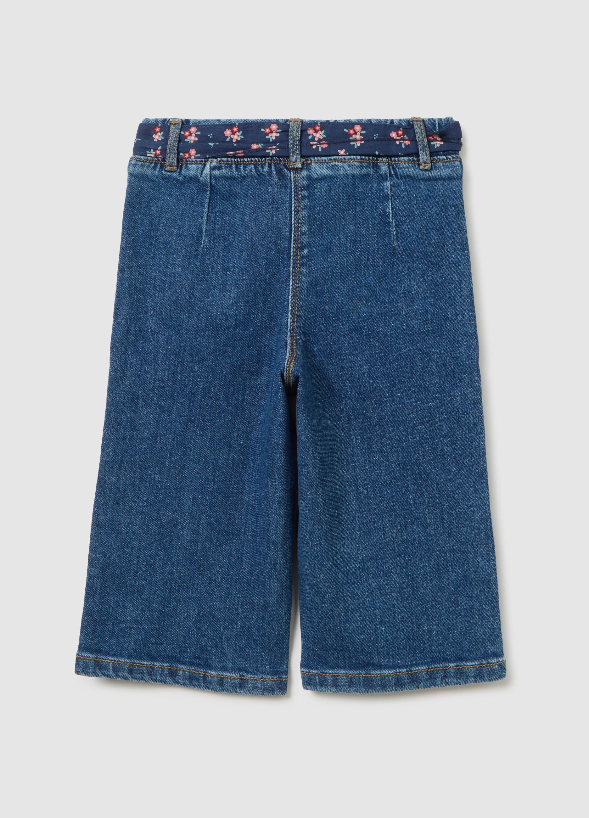 Wide elasticated blue denim trousers for girls