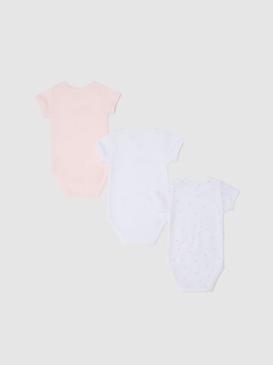 Three-pack white and pink bodysuits in organic cotton with print_1