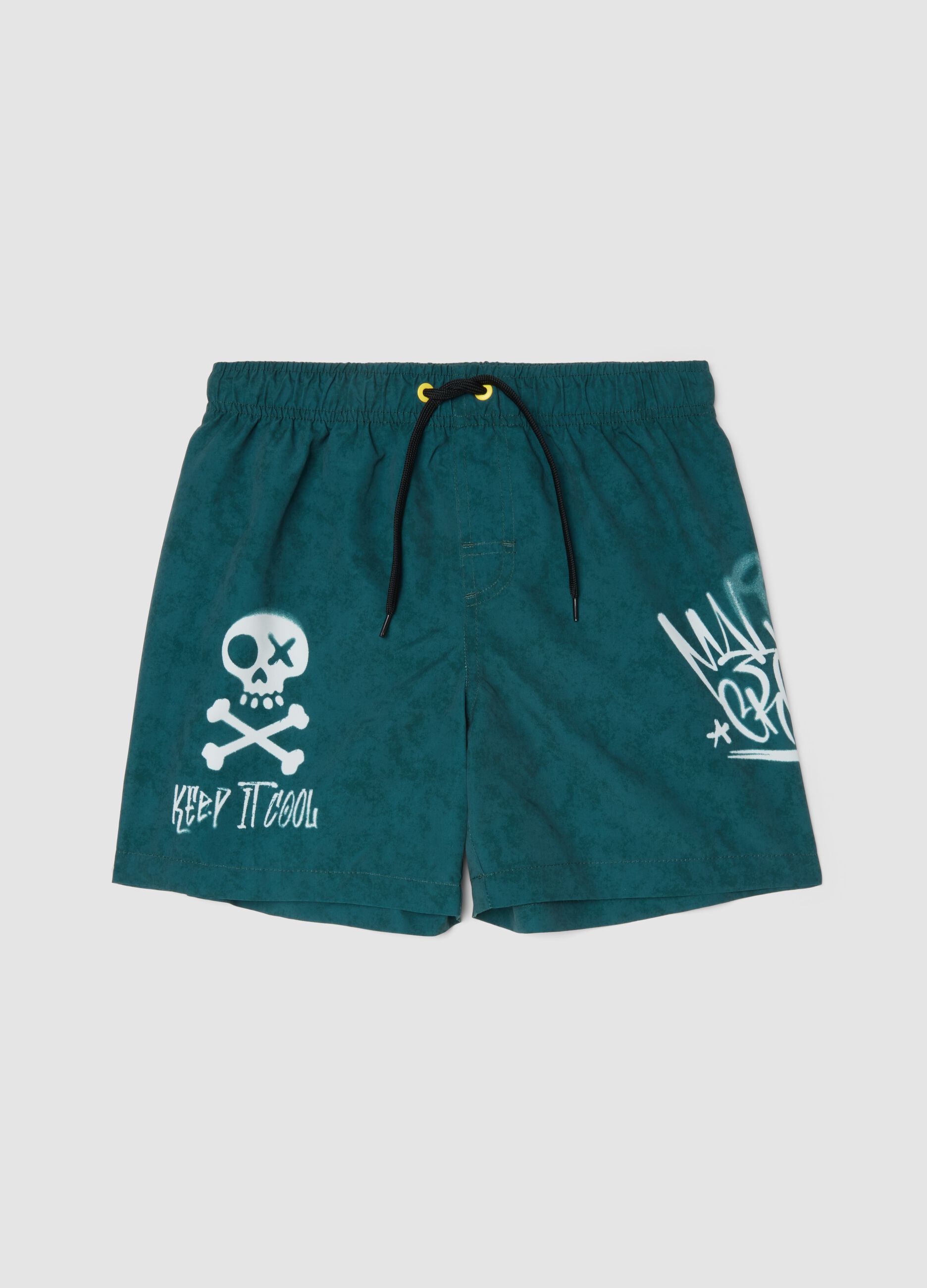 Green swim shorts with graphic print