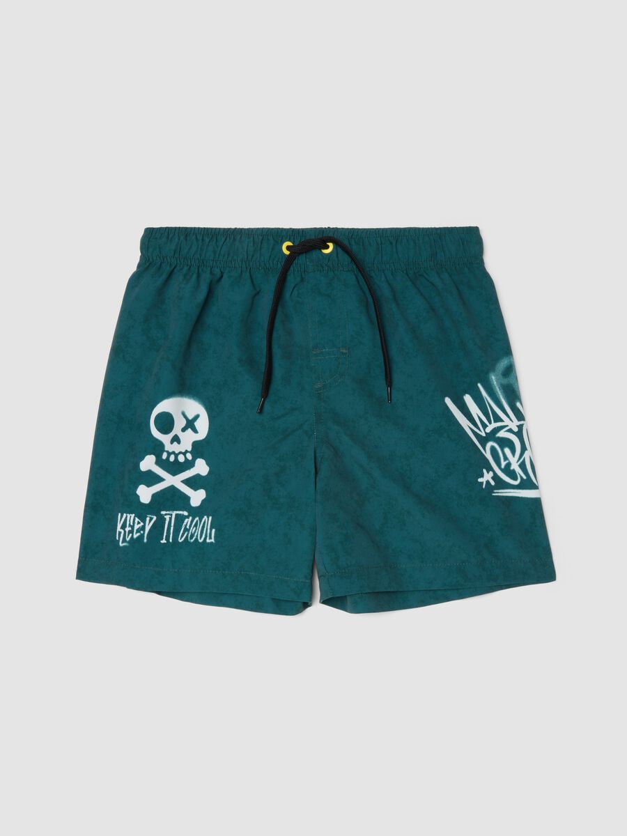 Green swim shorts with graphic print_0