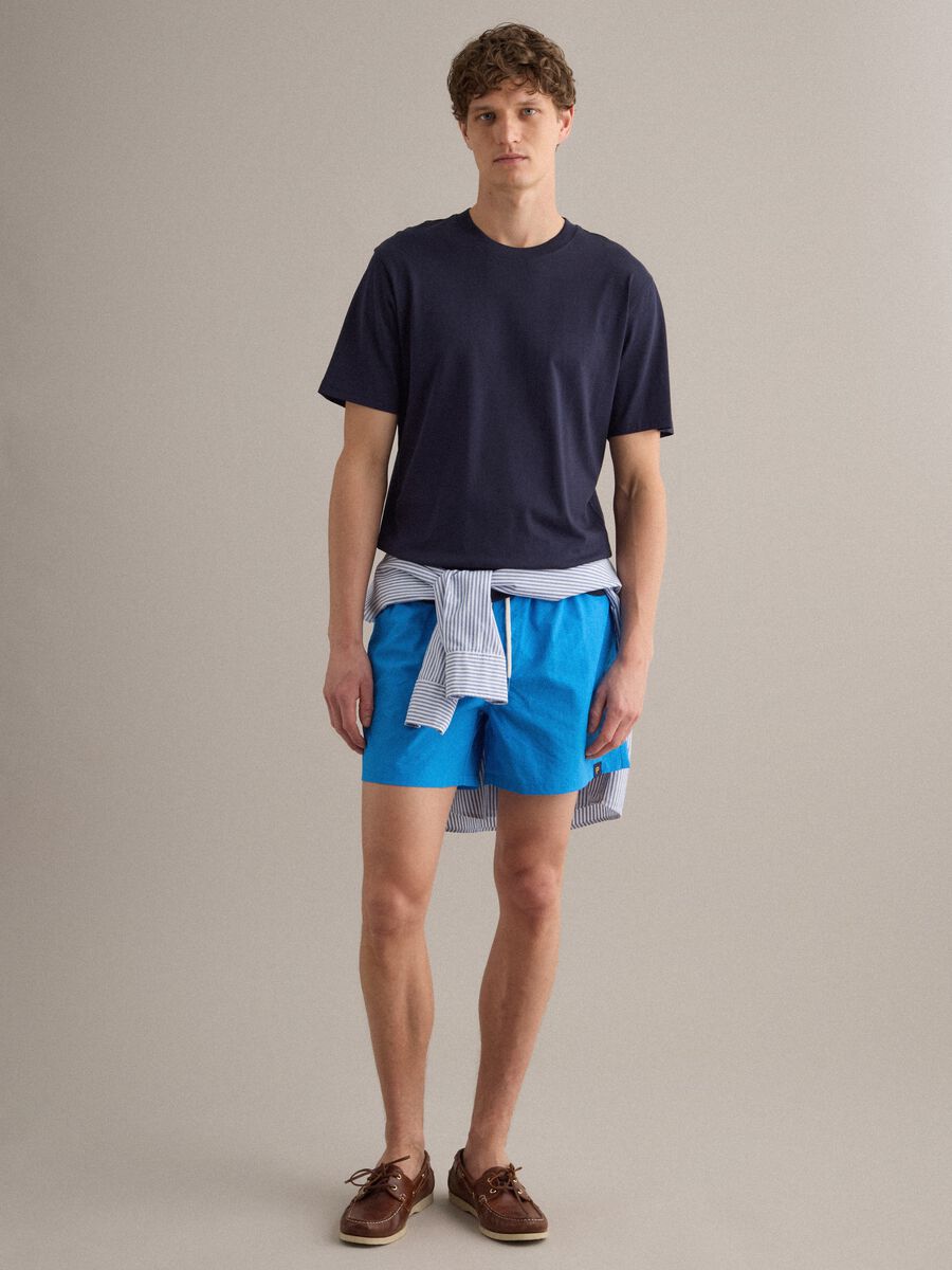 Boxer da mare azzurri con vita elasticizzata e coulisse_1