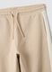 Beige pure cotton jogger trousers with side stripes for boys_5