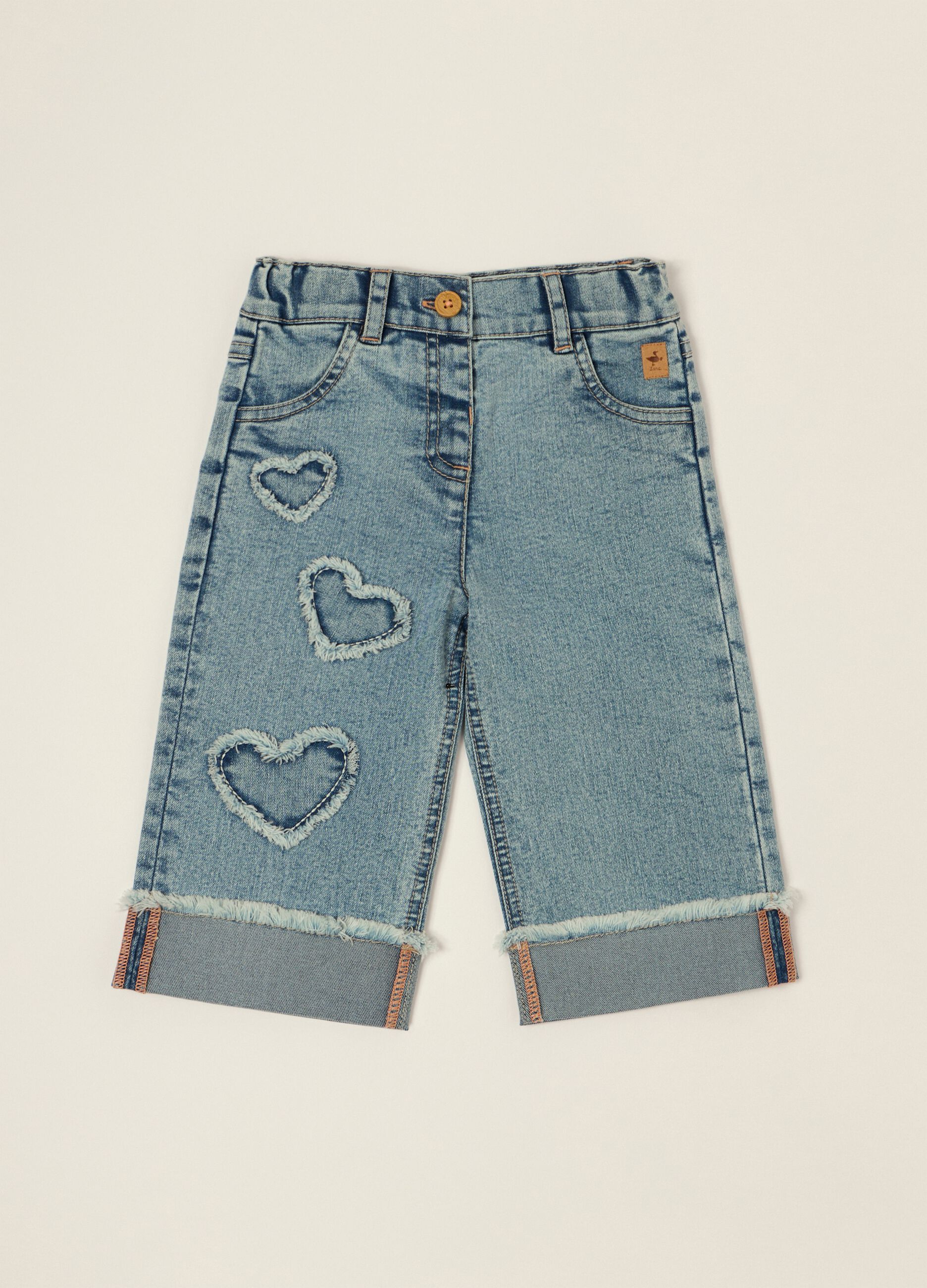 Stretch cotton denim jeans with embroidered hearts for baby girls