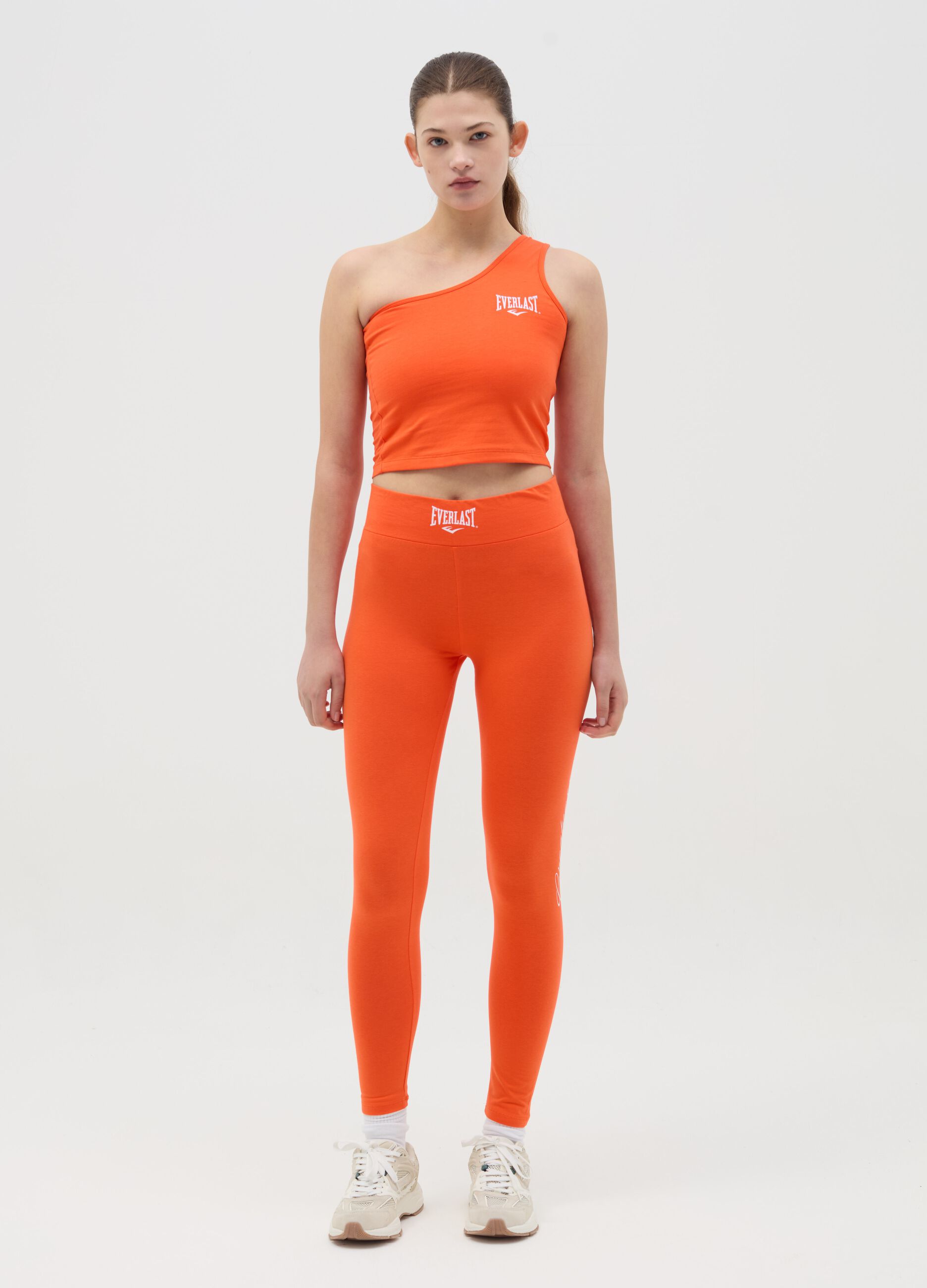 Top monospalla con stampa logo