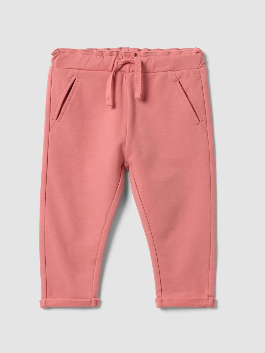 Jogger rosa in cotone elasticizzato con risvolto per bimba_0