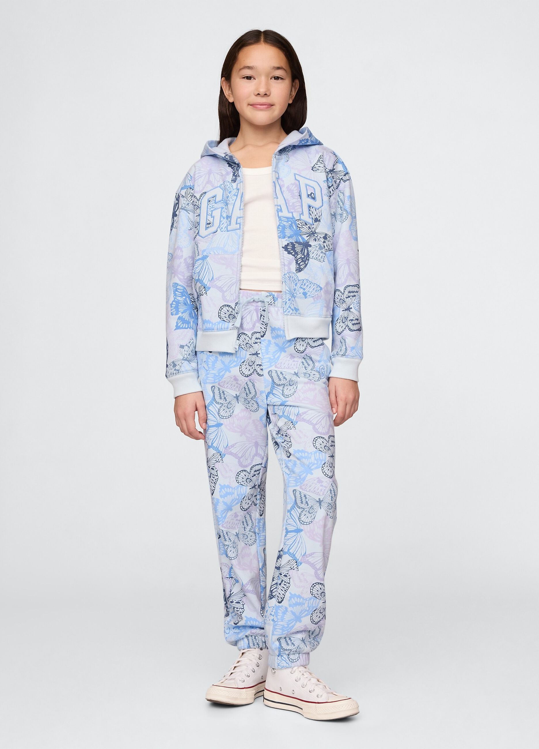 Light blue joggers with drawstring, logo embroidery and butterflies print