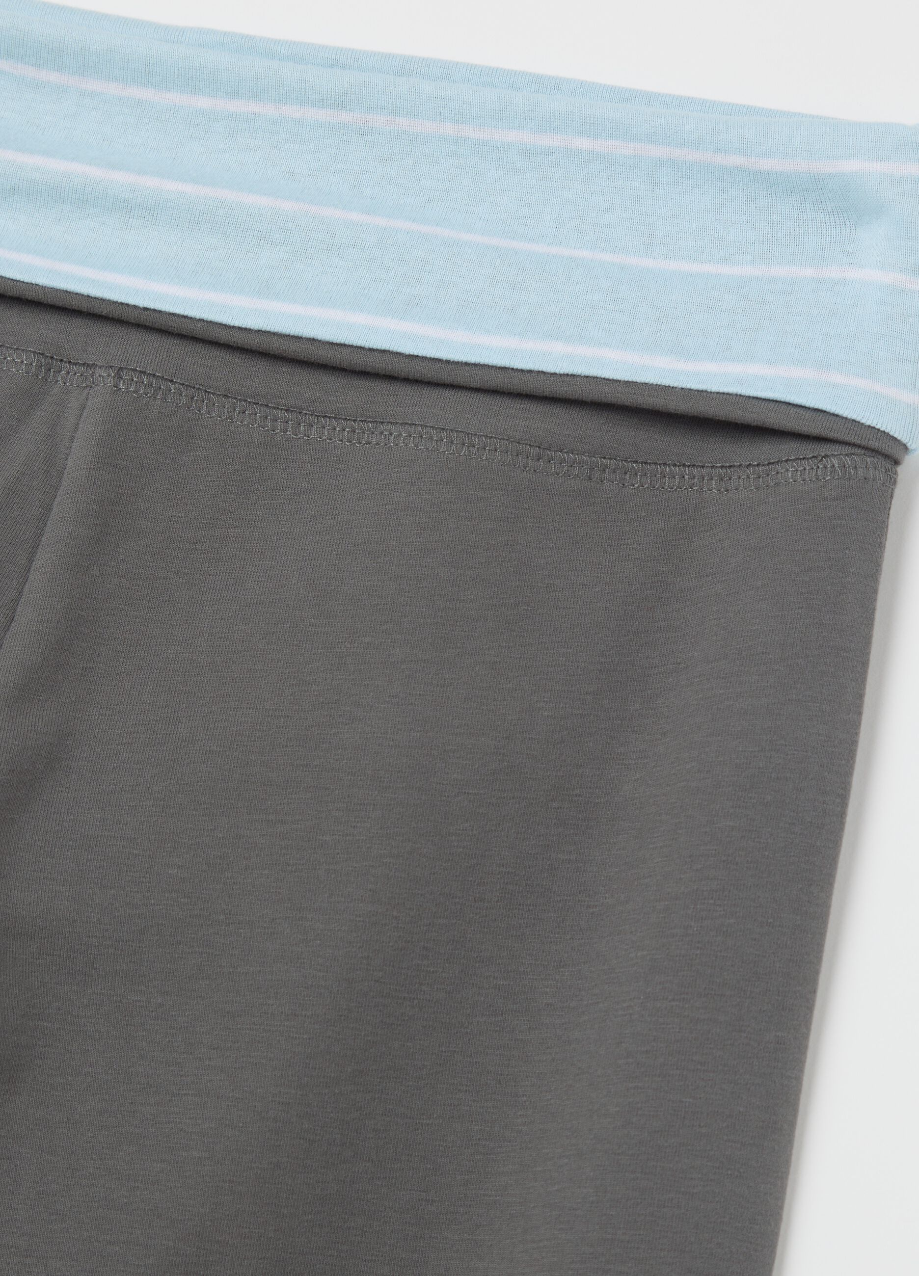 Grey flare-fit leggings with striped fold at the waist