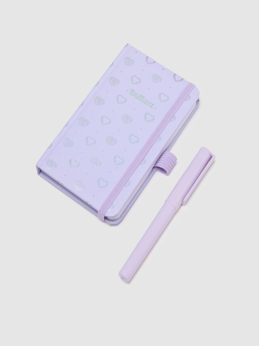 Purple paper notebook with elastic closure and pen_1