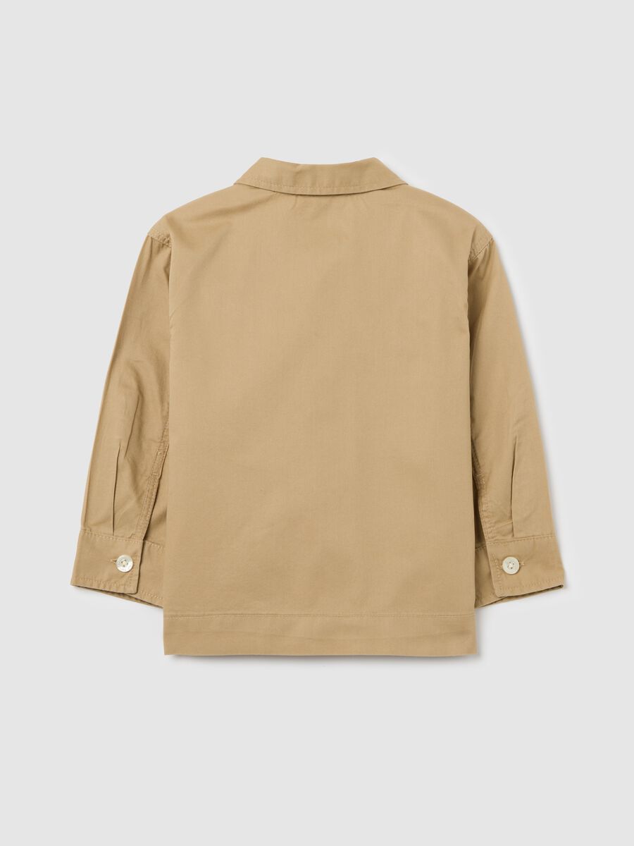 Beige shirt in cotton with pockets and palms embroidery_1