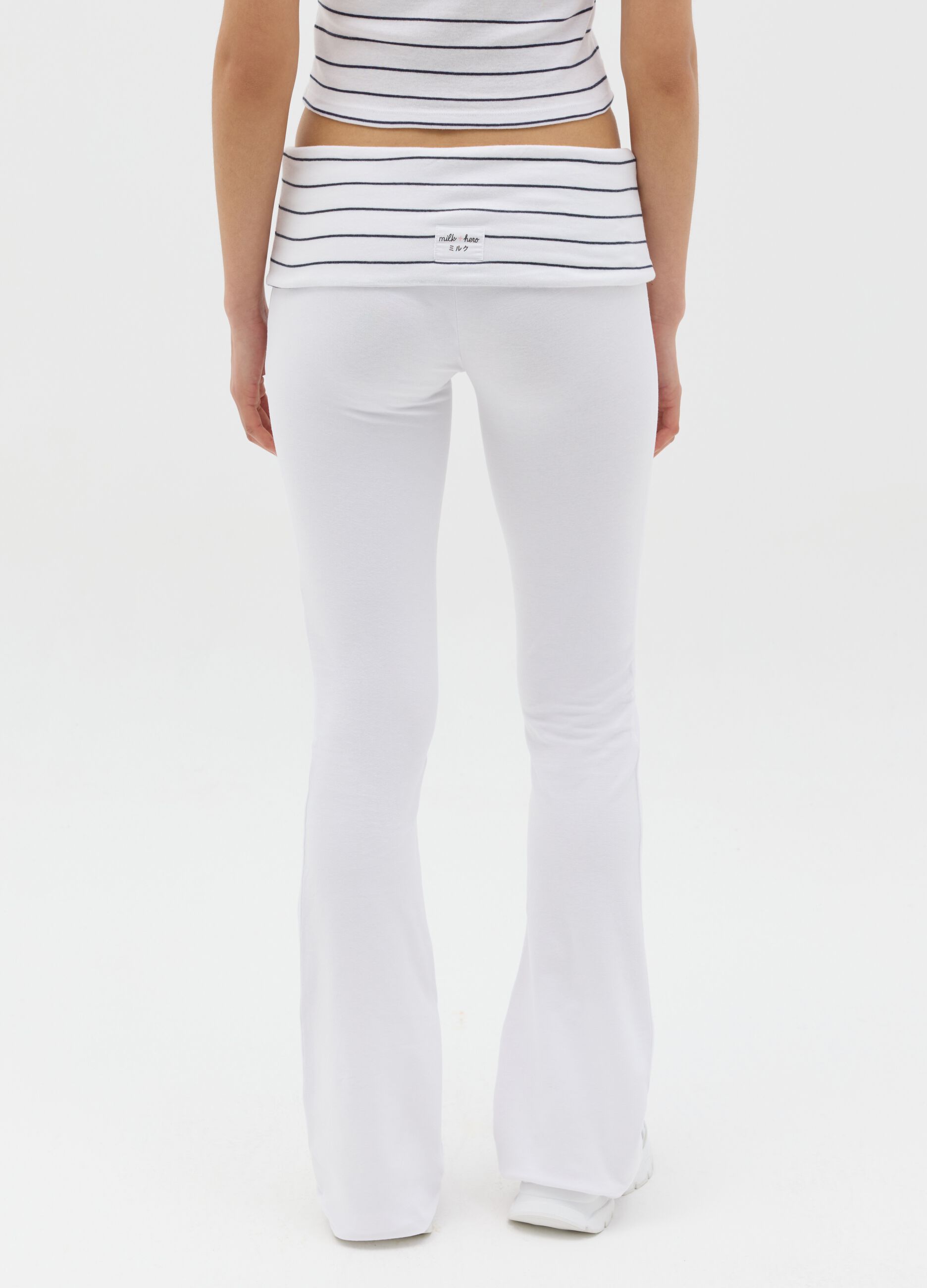 White flare-fit leggings with striped fold at the waist