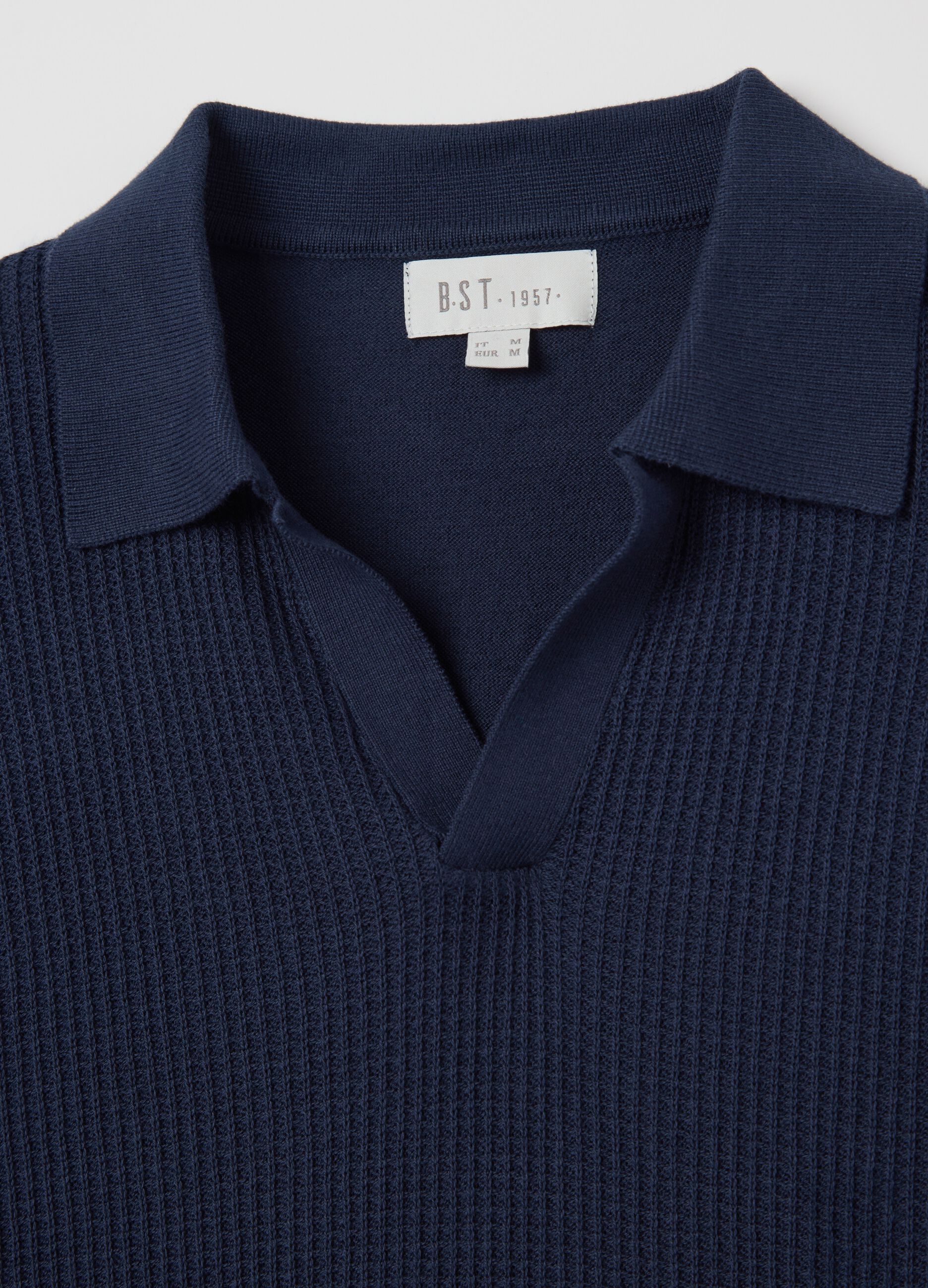 Blue polo shirt with jacquard weave
