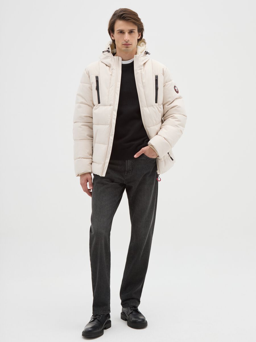 Giacca imbottita beige con cappuccio e zip_1