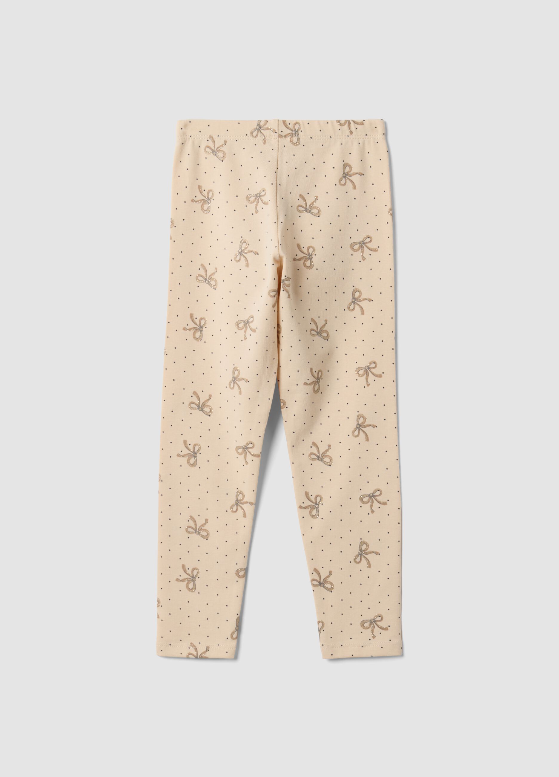 Leggings skinny beige in cotone organico elasticizzato con fiocchi per bambina
