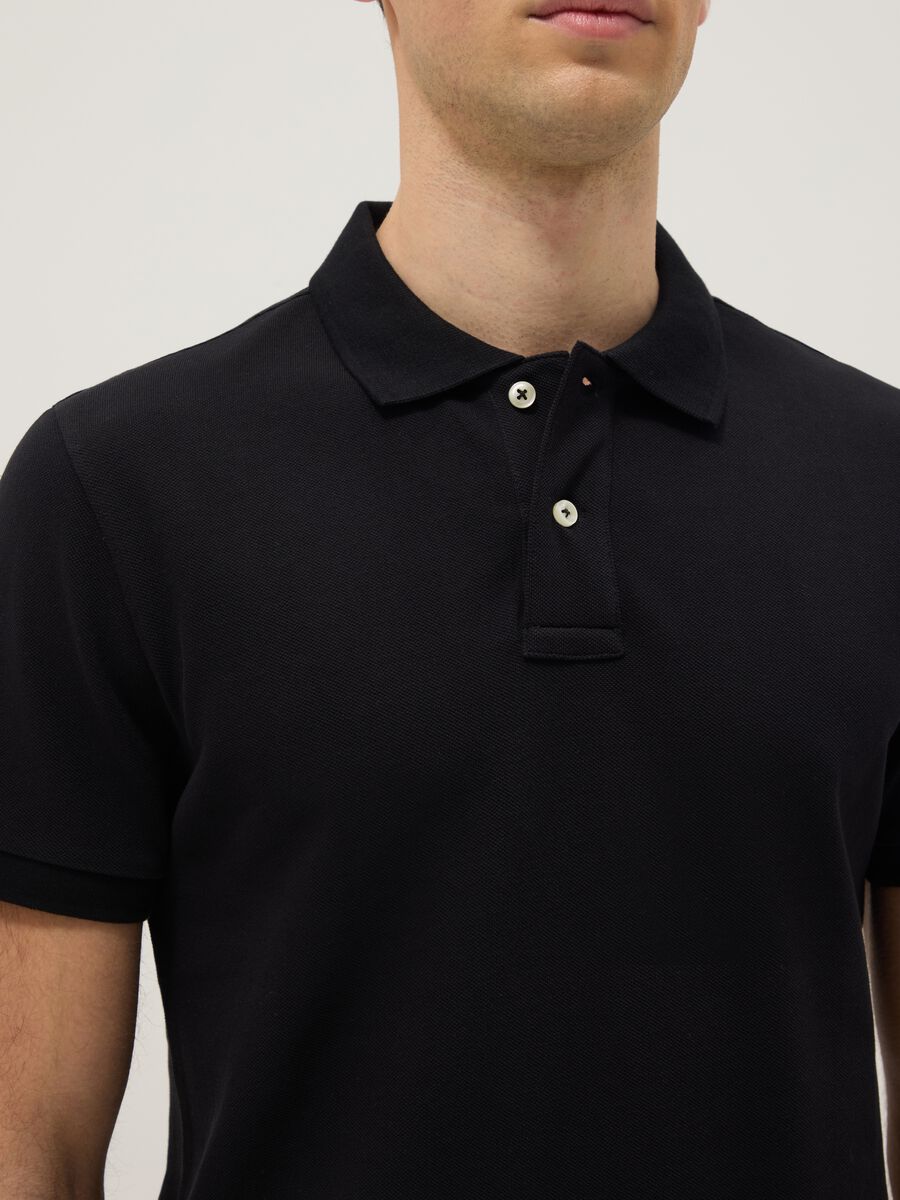 Polo a maniche corte in puro cotone organico nero slim fit_3