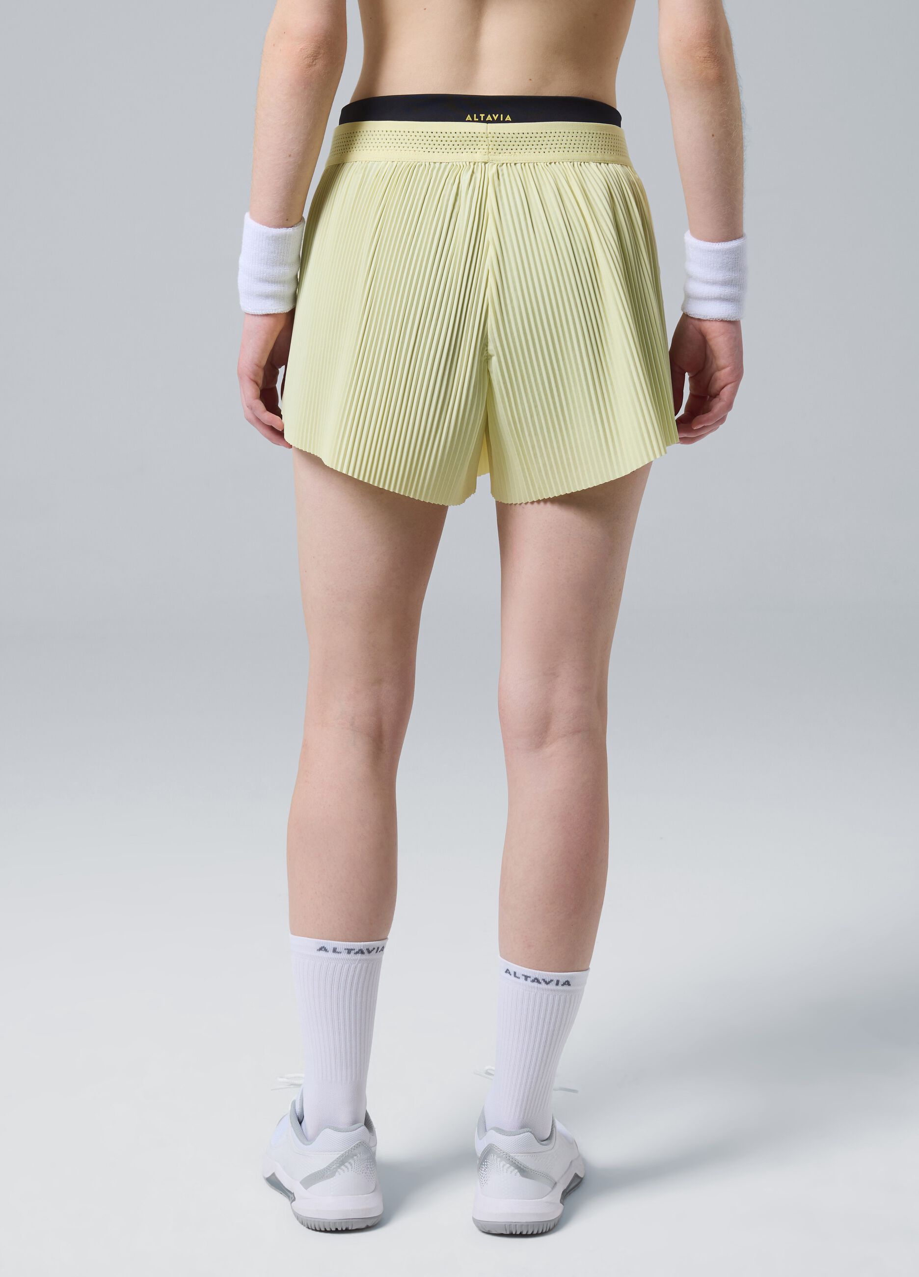 Shorts plissettati sportivi gialli in tessuto elasticizzato rimovibili ALTAVIA COURT