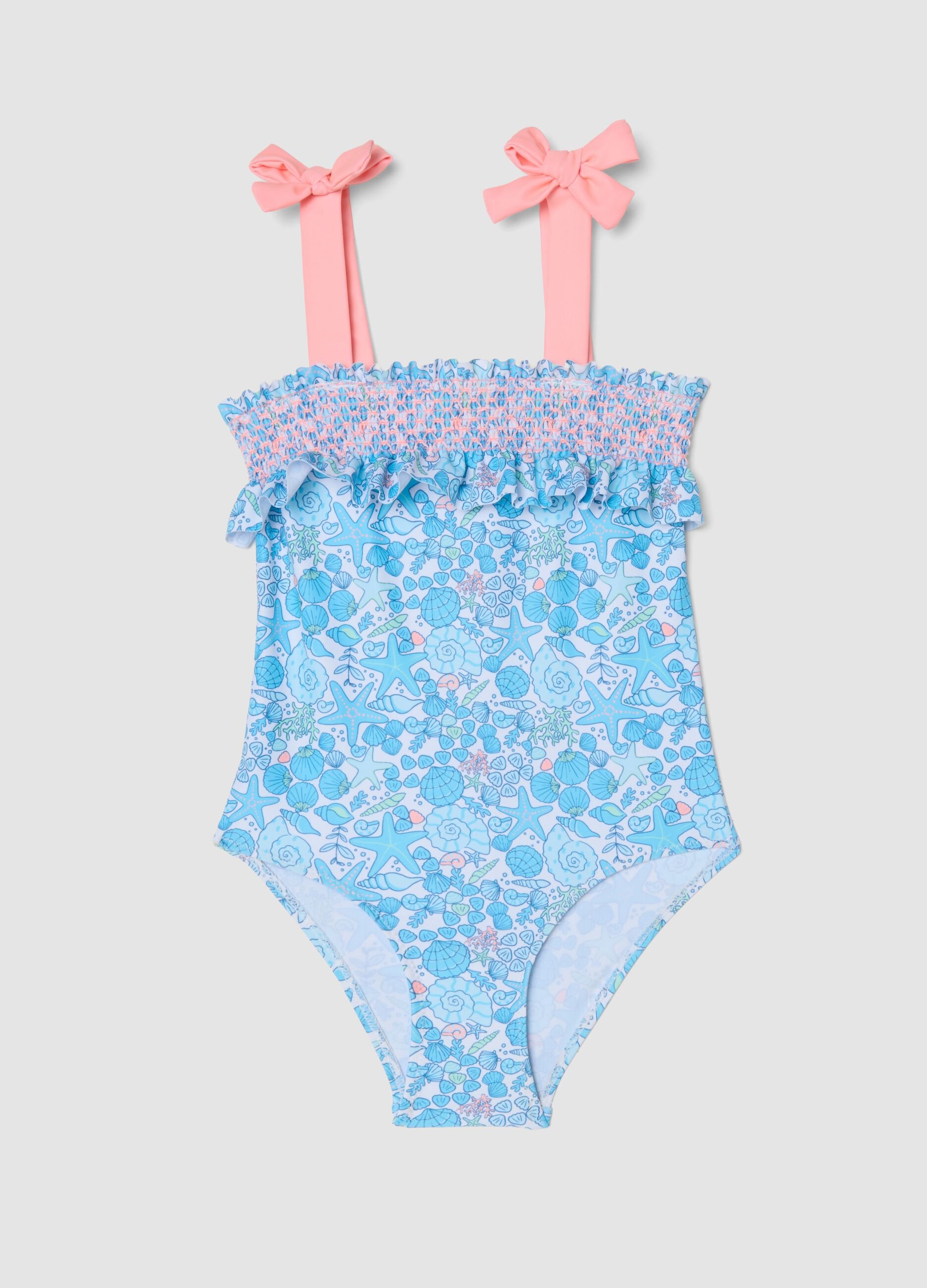 Blue stretch swimsuit with marine print for girls