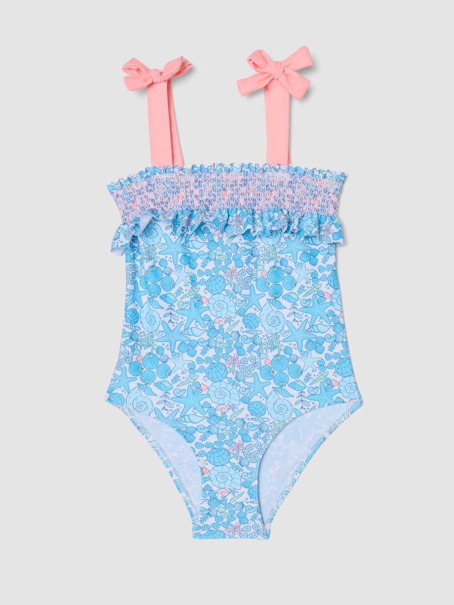 Costume intero azzurro in tessuto elasticizzato con stampa marina per bambina_0