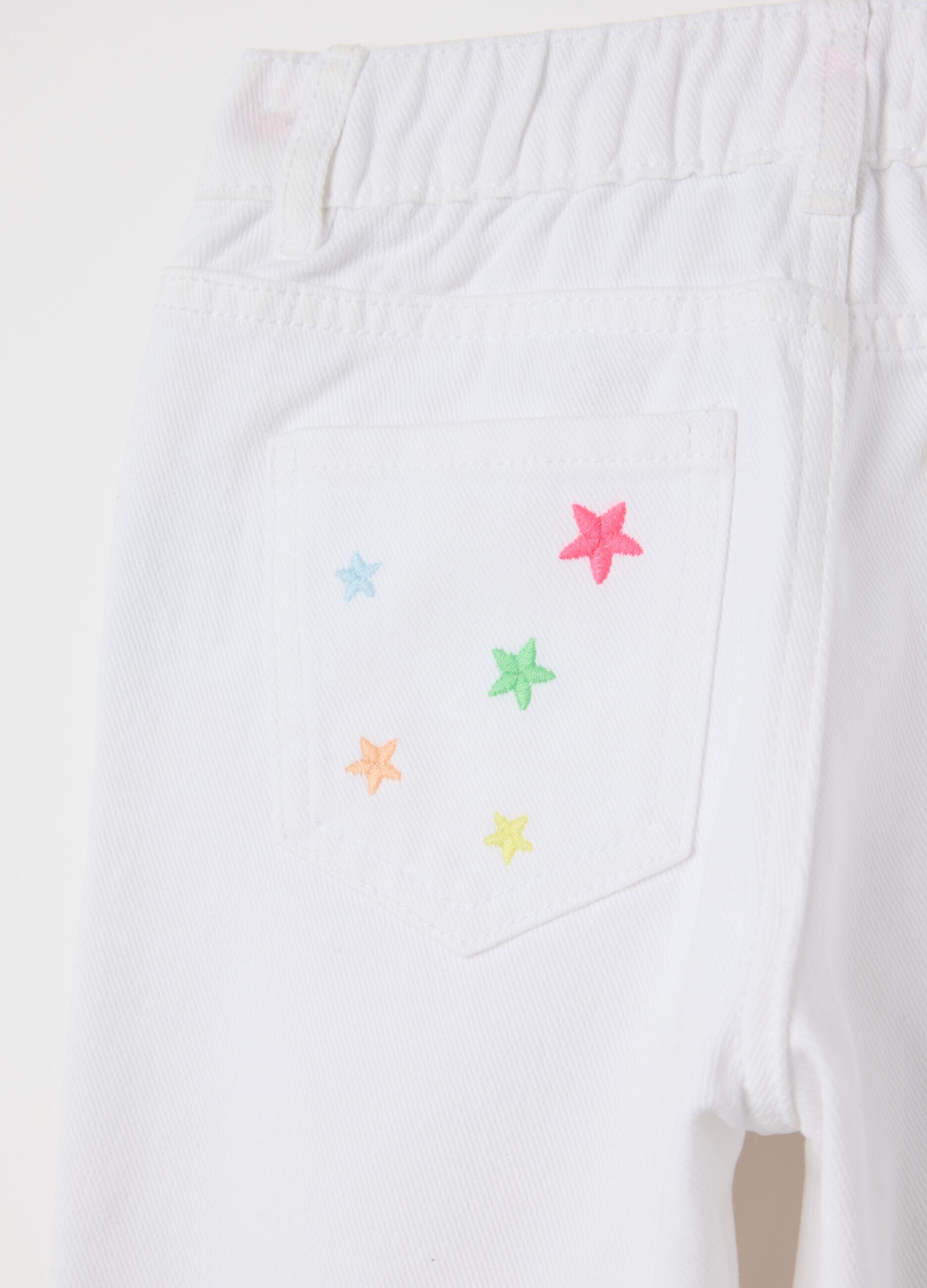 White trousers in drill with stars embroidery