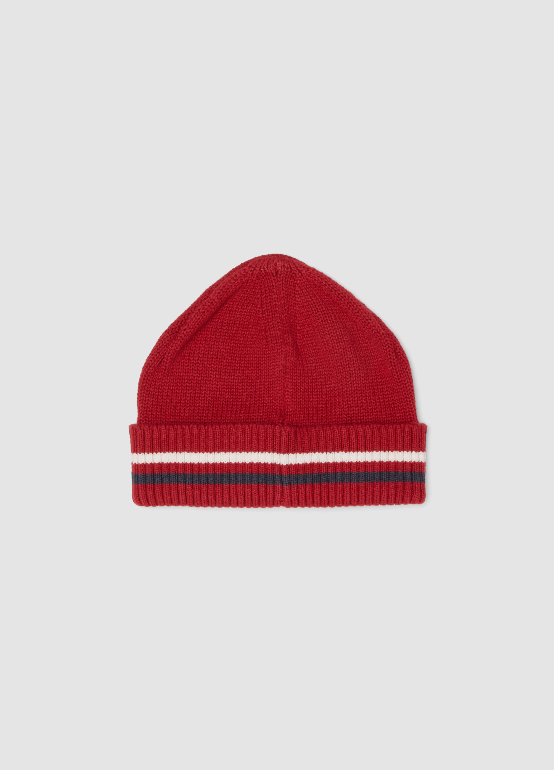 Red baby hat in pure organic cotton jersey knit with teddy bear patch