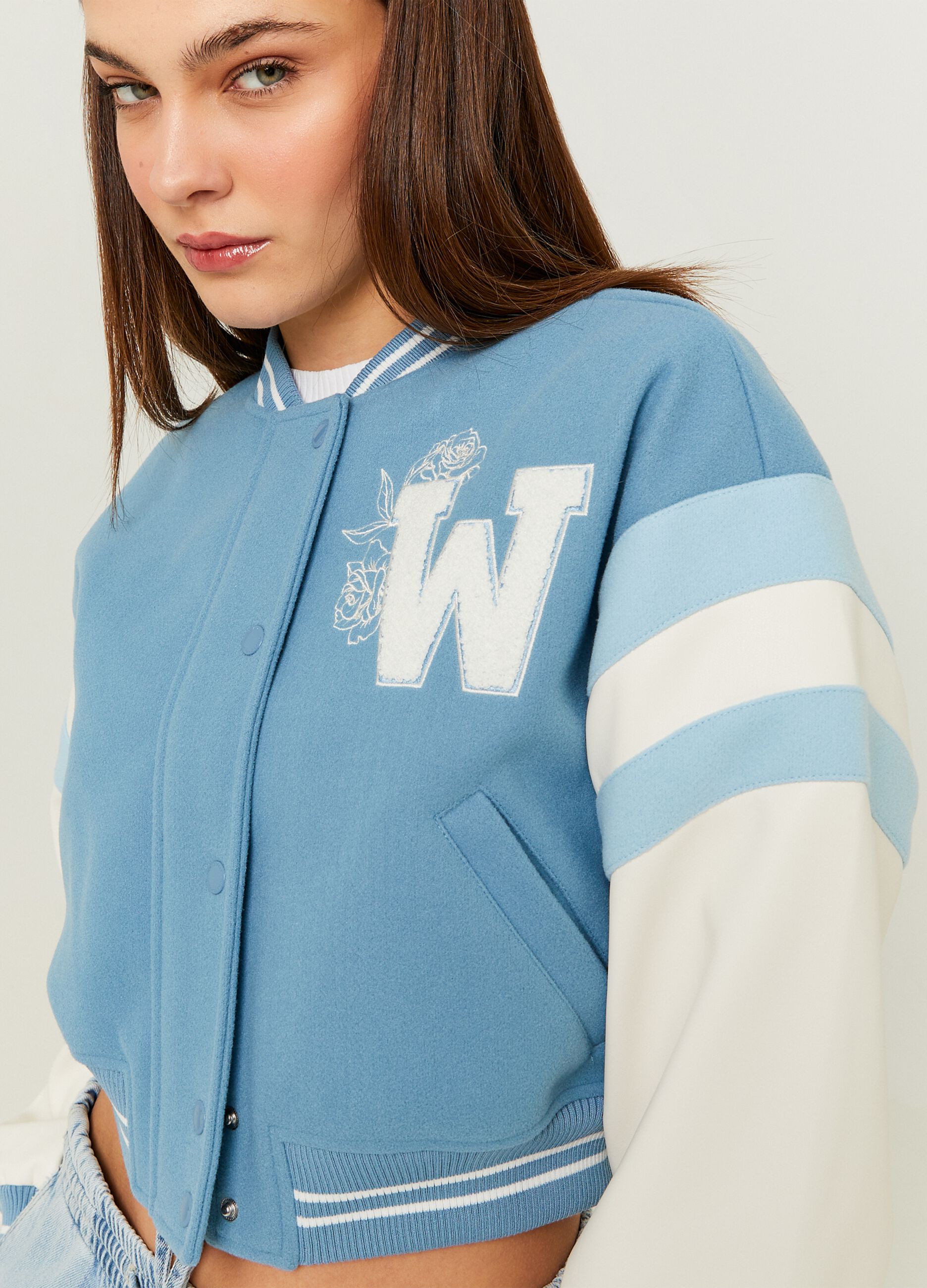 Varsity bomber jacket with embroidery and bouclé application