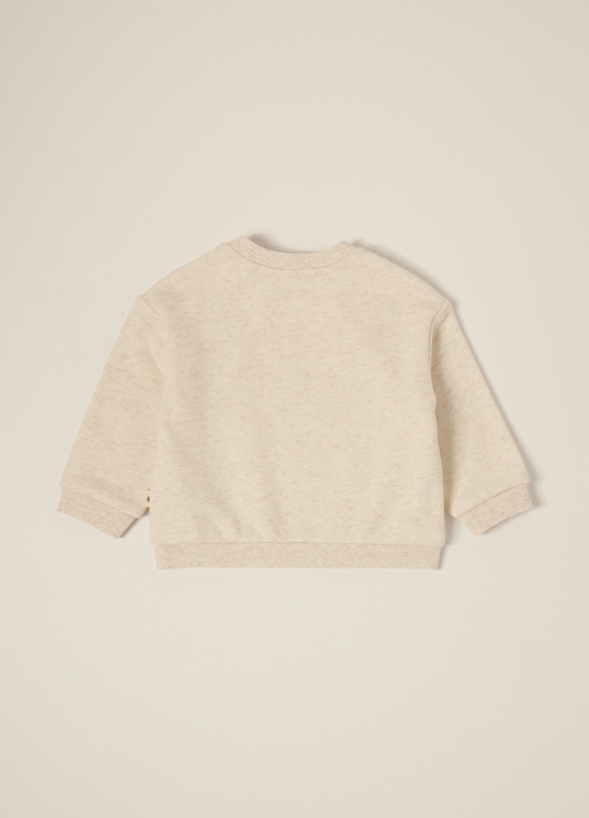 Beige sweater with dog appliqués