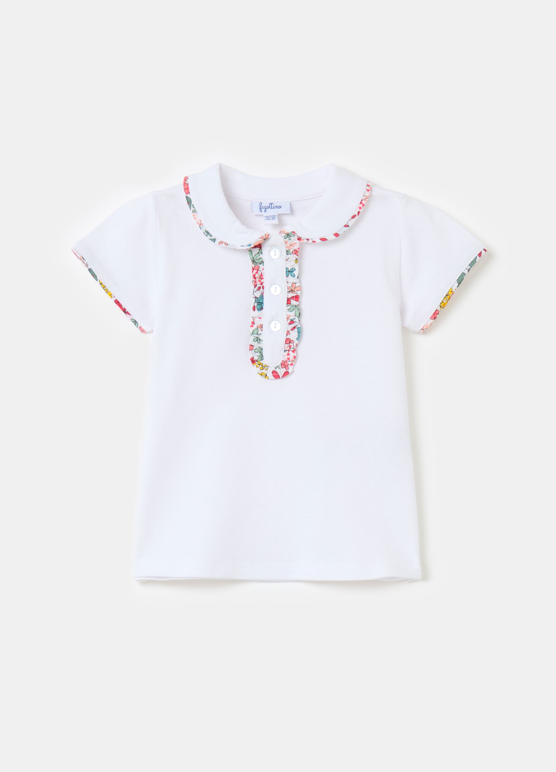 Polo shirt in piquet with floral patterned trims