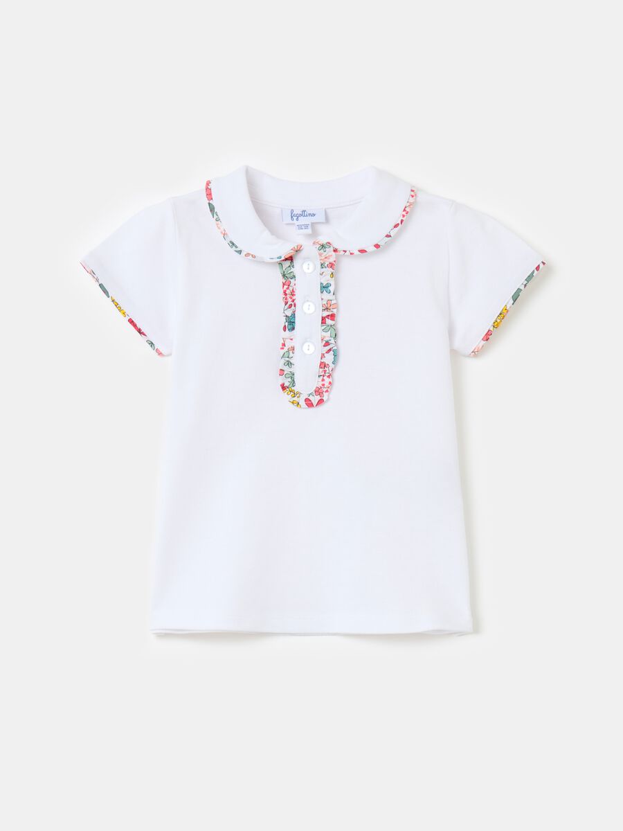 Polo shirt in piquet with floral patterned trims_0