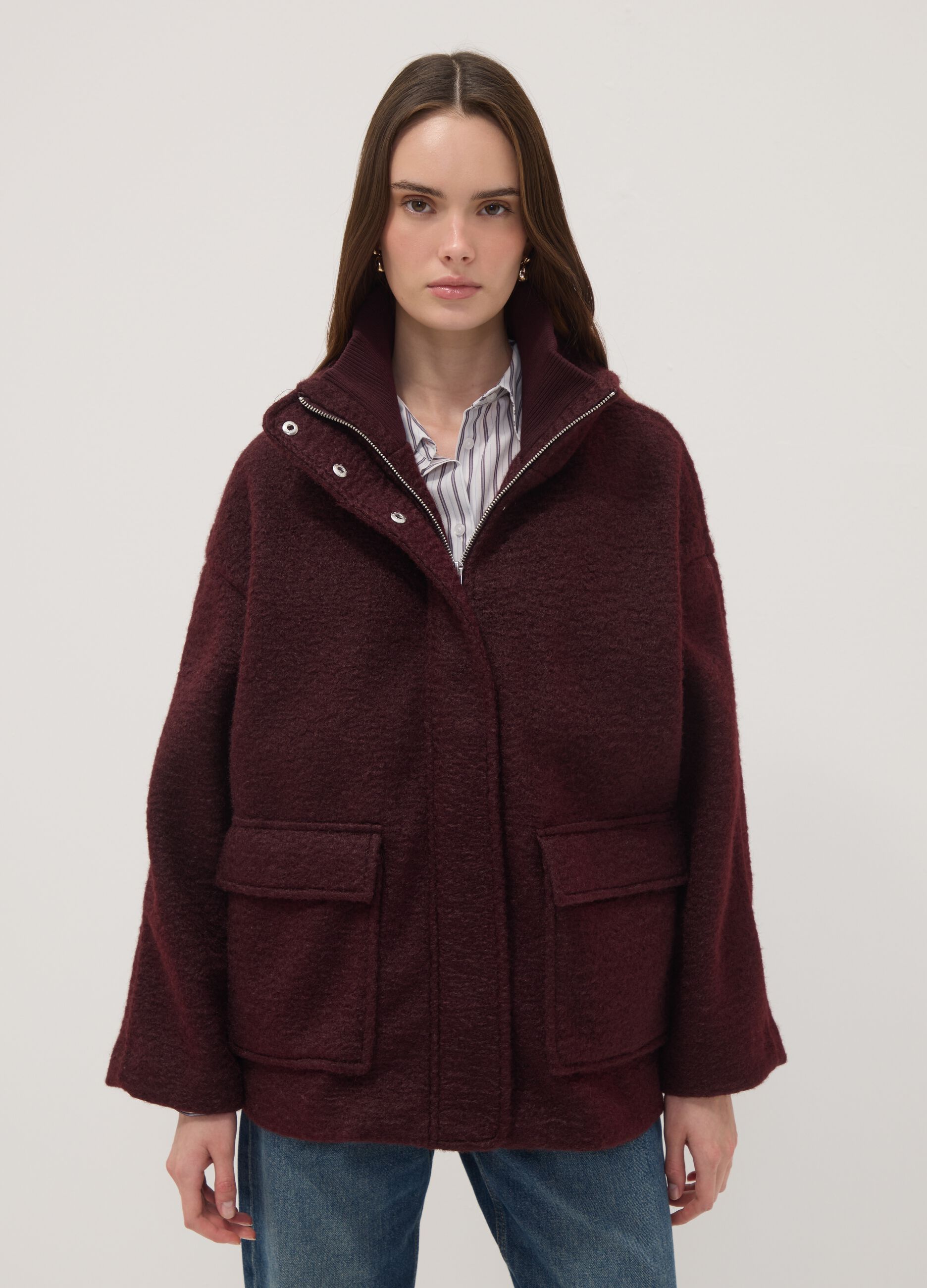 Red jacket with zip and press studs