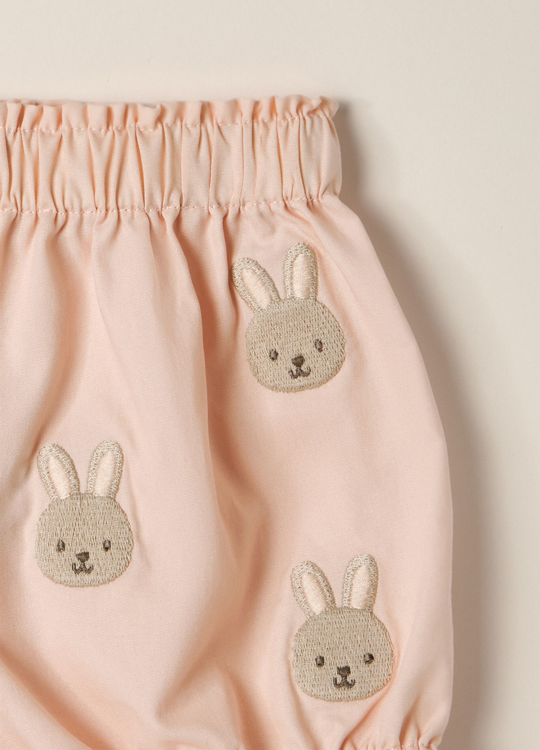 Newborn set with cotton bodysuit and skirt