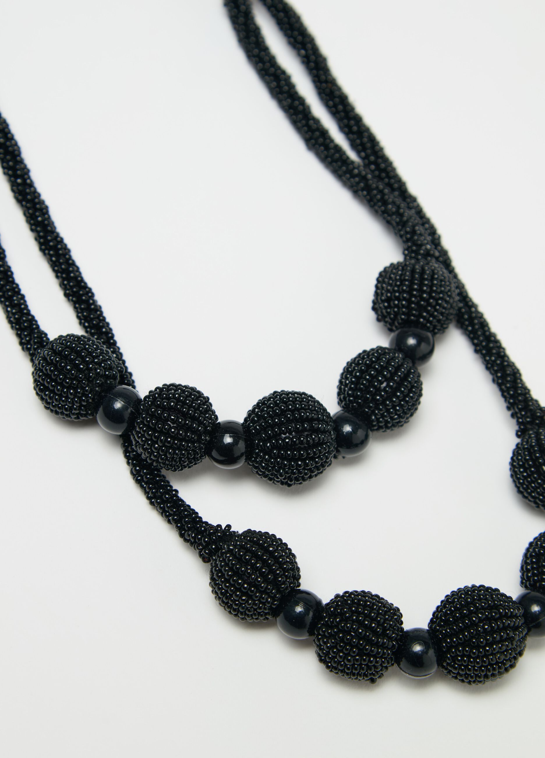 Long double-strand necklace with beads