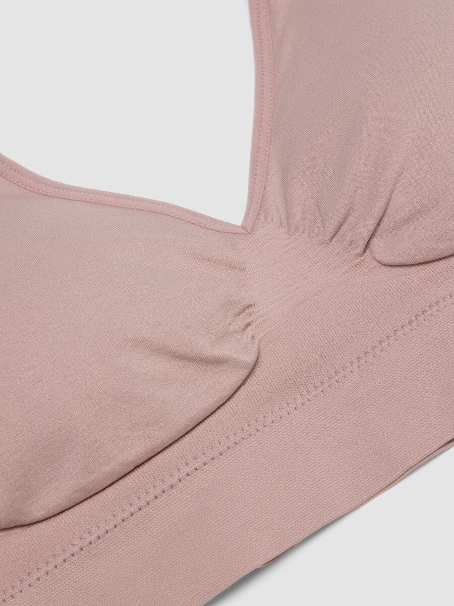 Reggiseno rosa in tessuto elasticizzato con imbottitura removibile_1