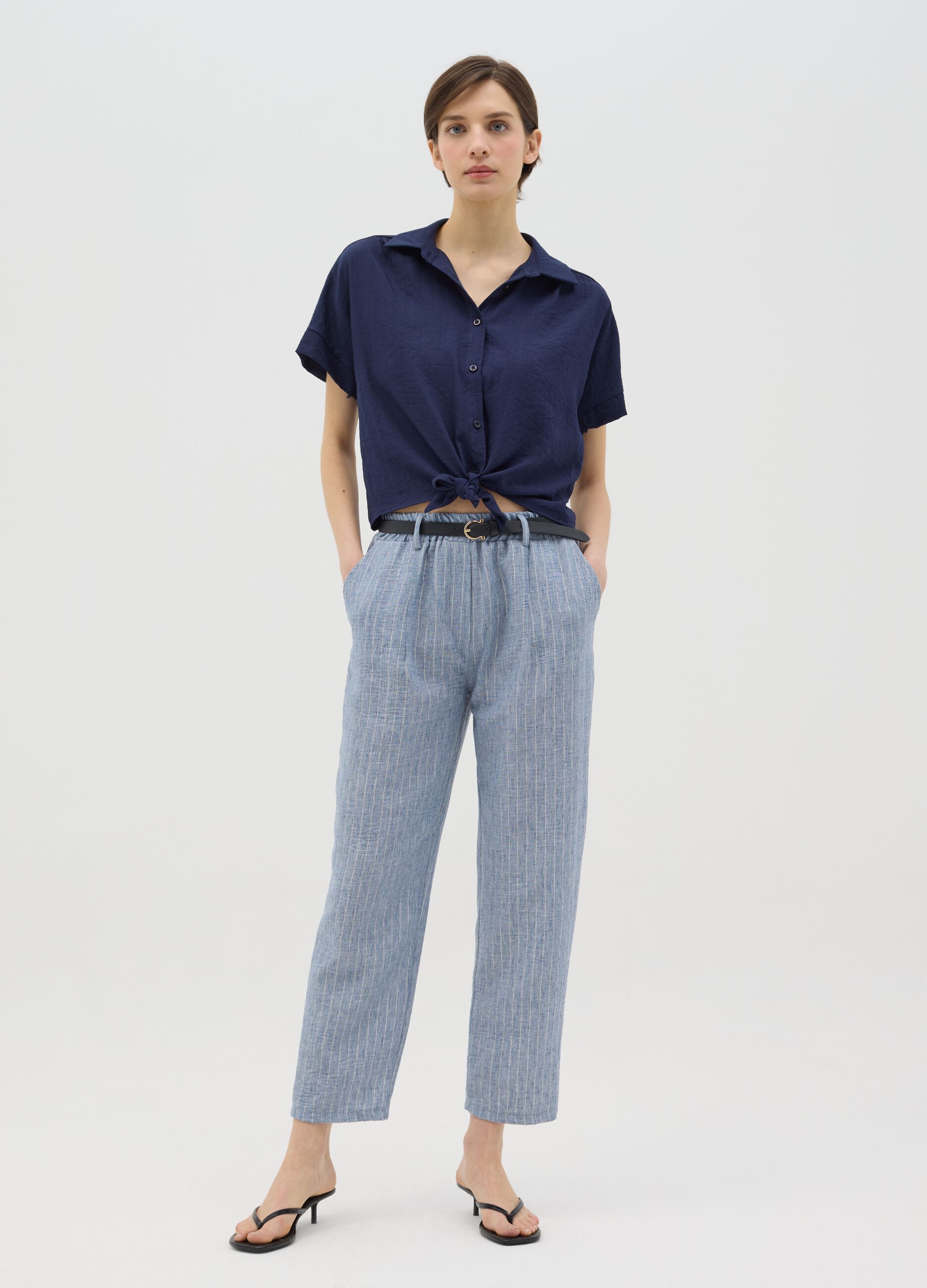 Blue trousers in stretch fabric