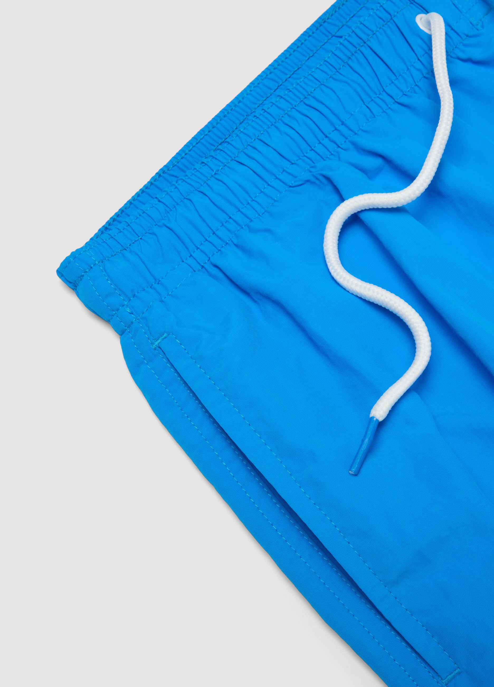 Boxer da mare blu con elastico in vita