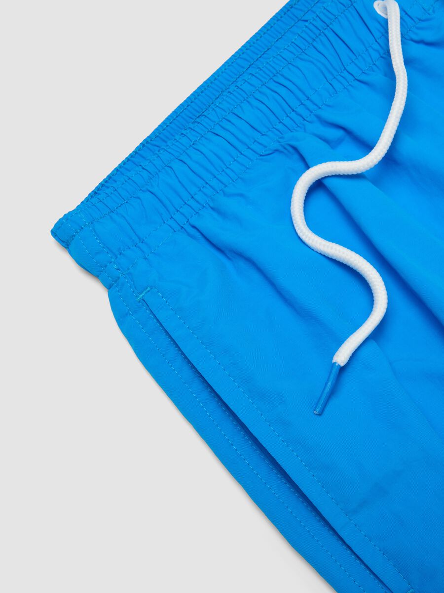 Blue swim shorts with elasticated waistband_5