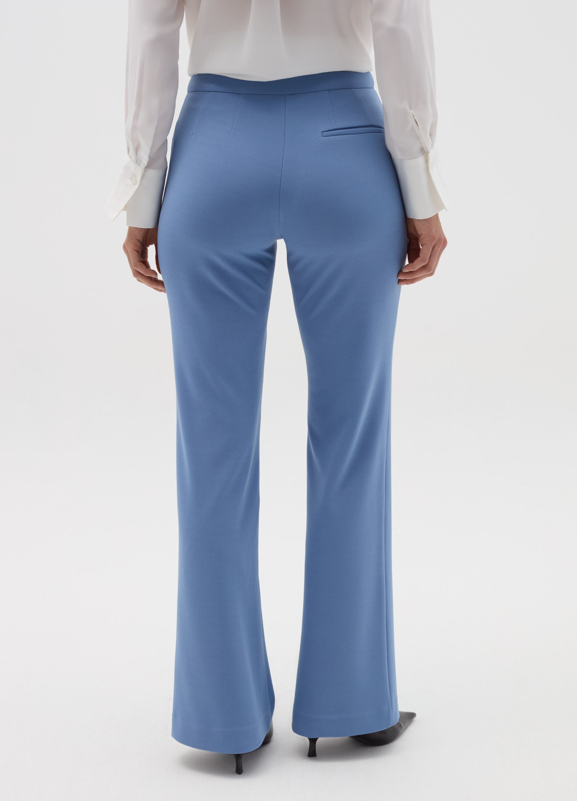 Pantalone flare fit tinta unita