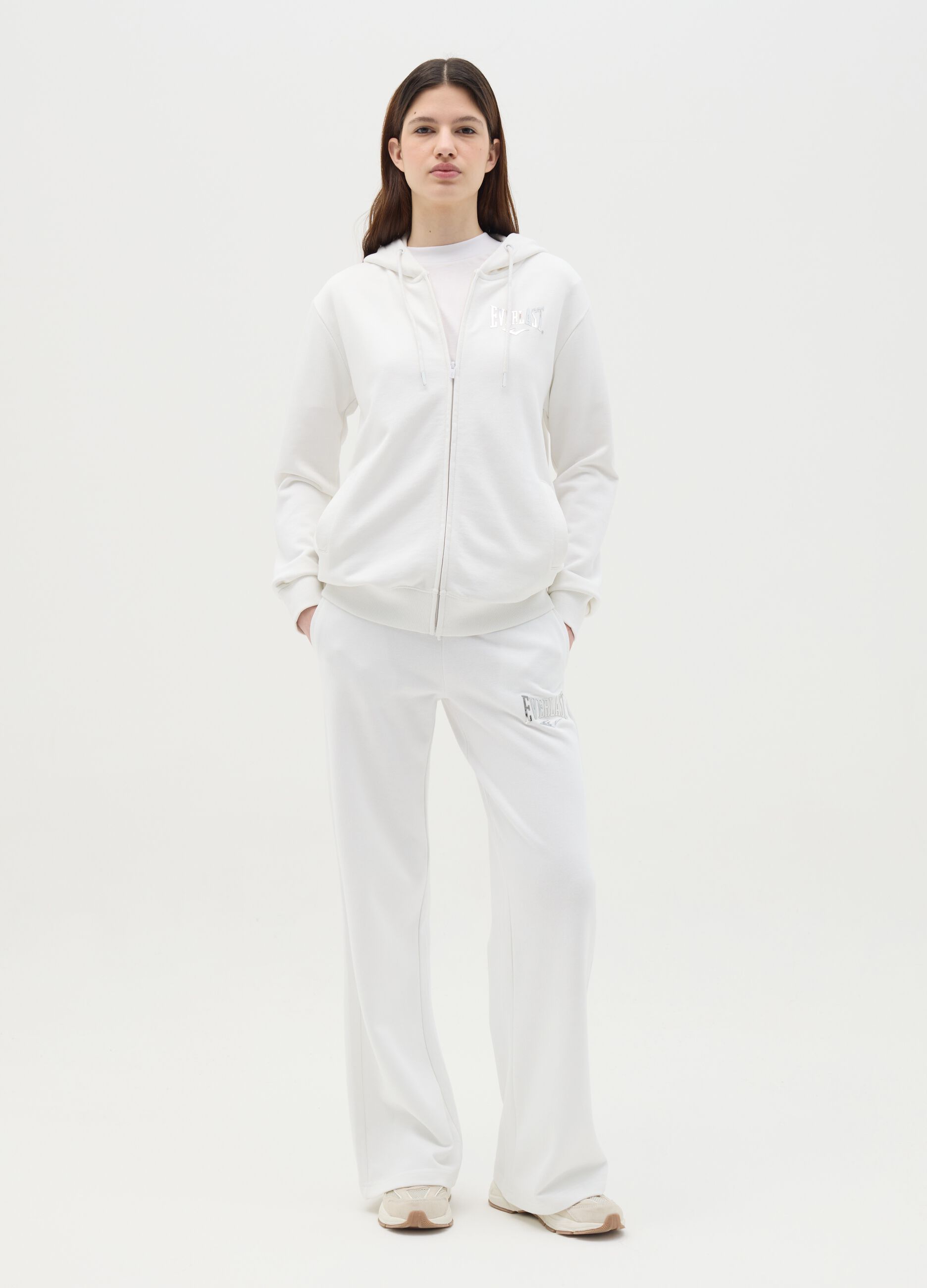 White flare joggers with drawstring and logo print