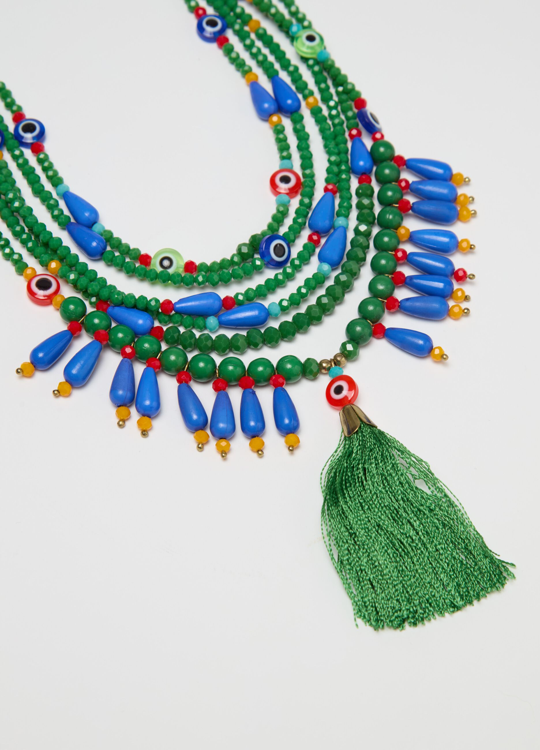 Multi-strand necklace with tassel and beads